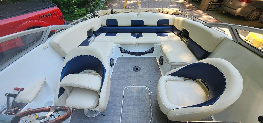 Interior of a 2007 Sea-Doo Sport Boats 230 Challenger SE with white and blue seating.