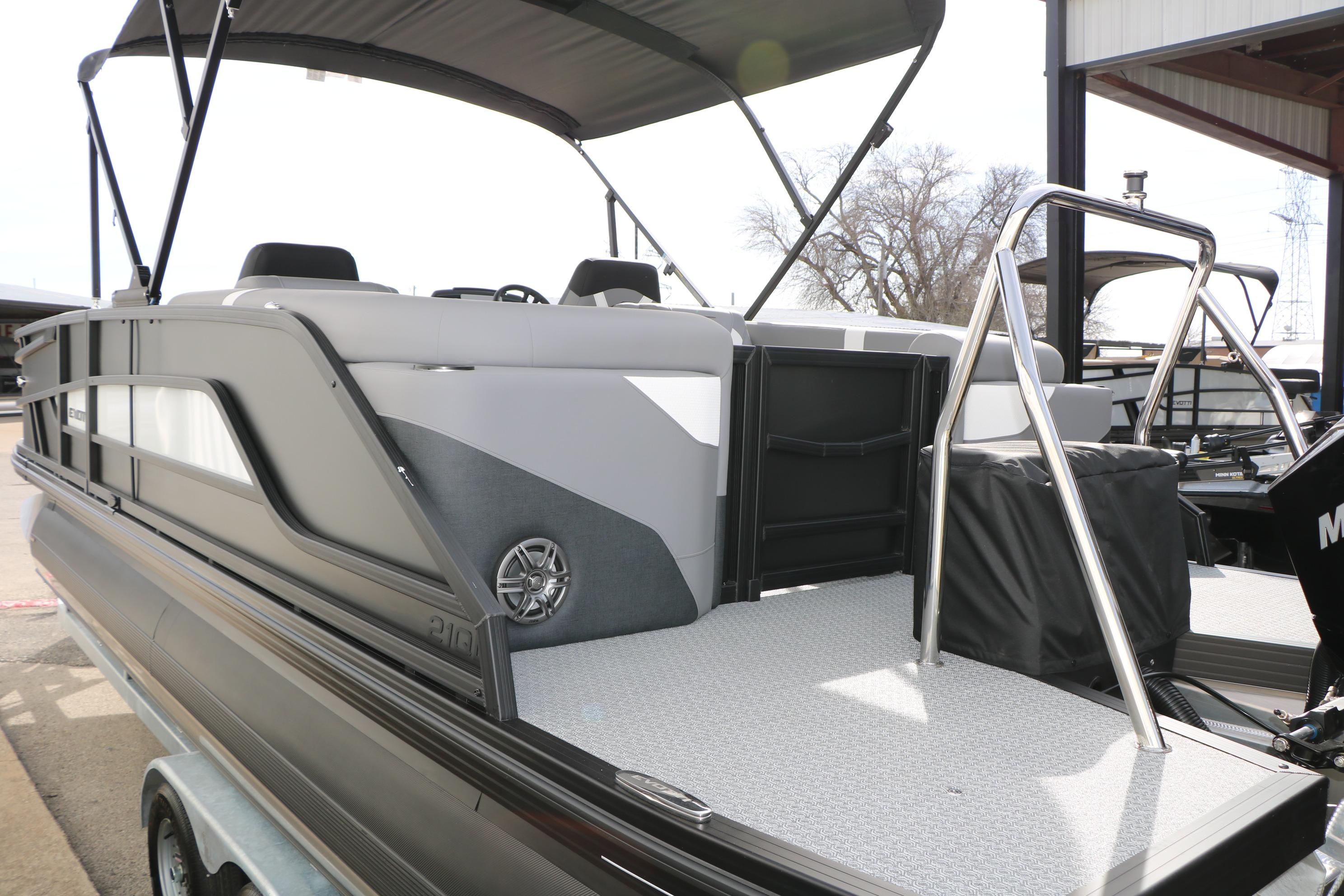 2026 Evotti 521QL pontoon boat with sleek design and modern seating.