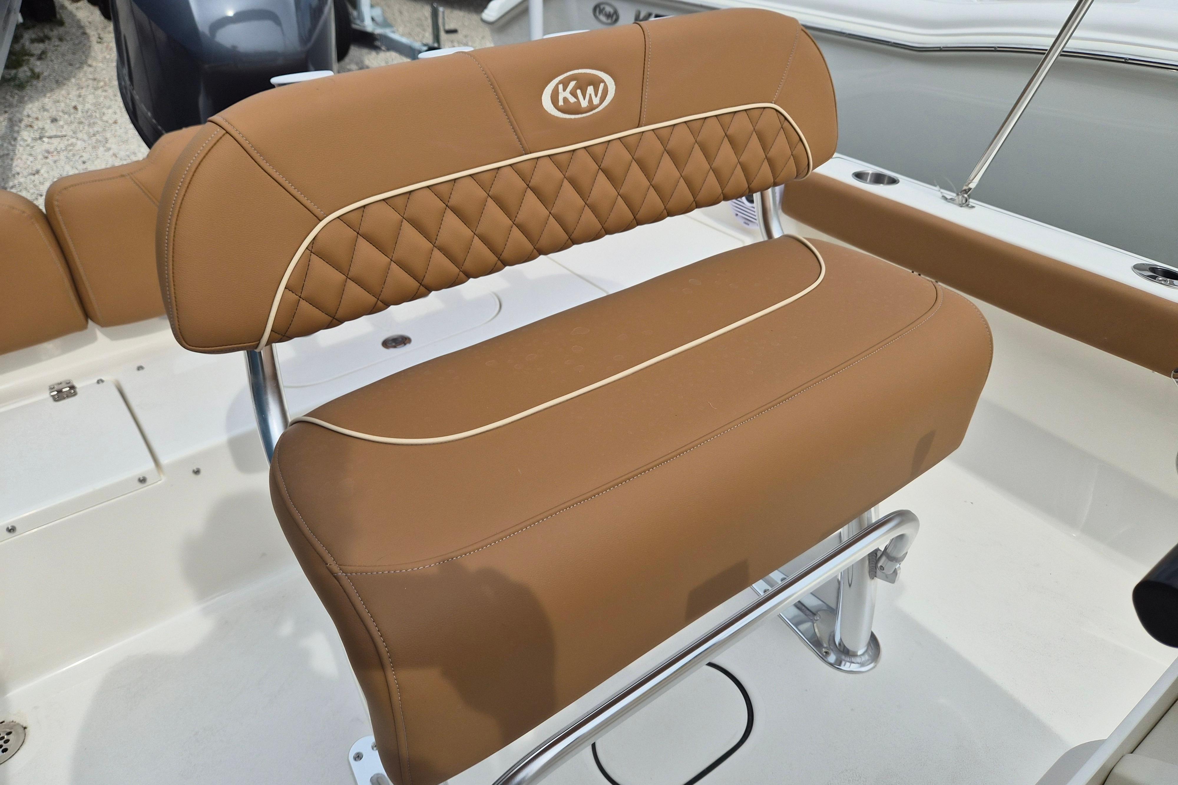 Brown leather seating on 2026 Key West 189 FS boat, featuring diamond stitching.