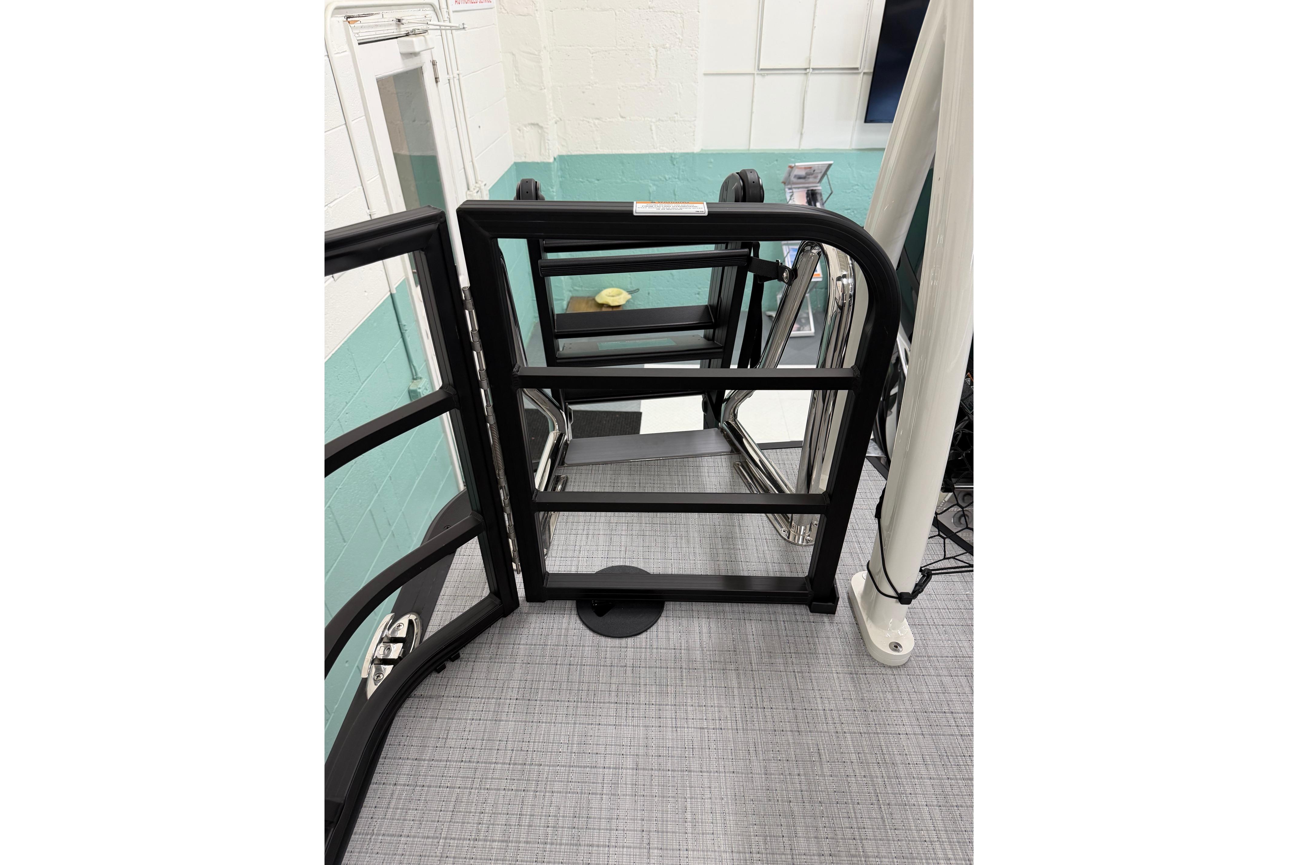 2026 South Bay 525SB2 boat gate with sleek black railing and modern design.
