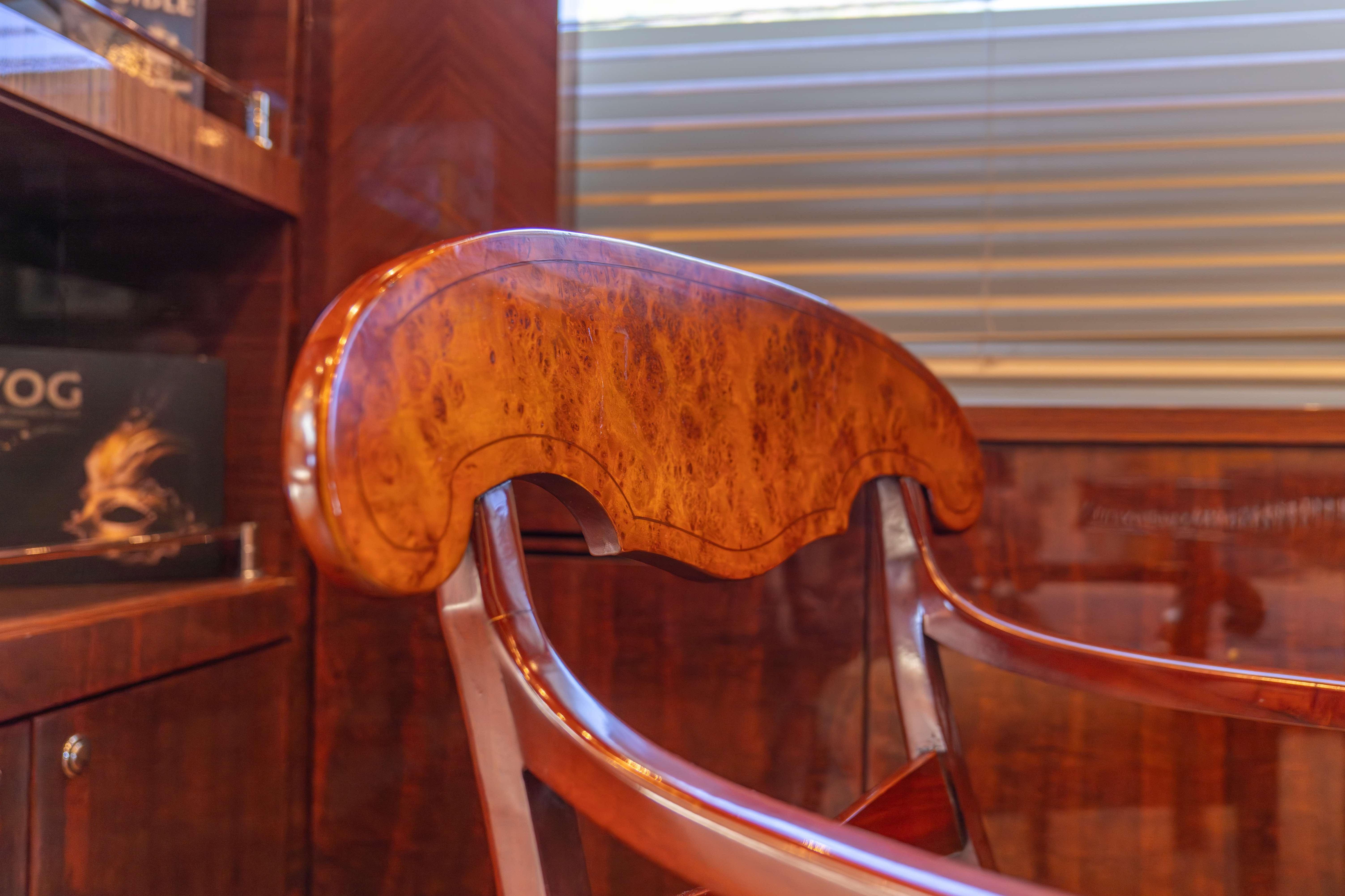 Luxurious wooden chair detail on Bilgin 147 yacht, 2014 model, with elegant craftsmanship.