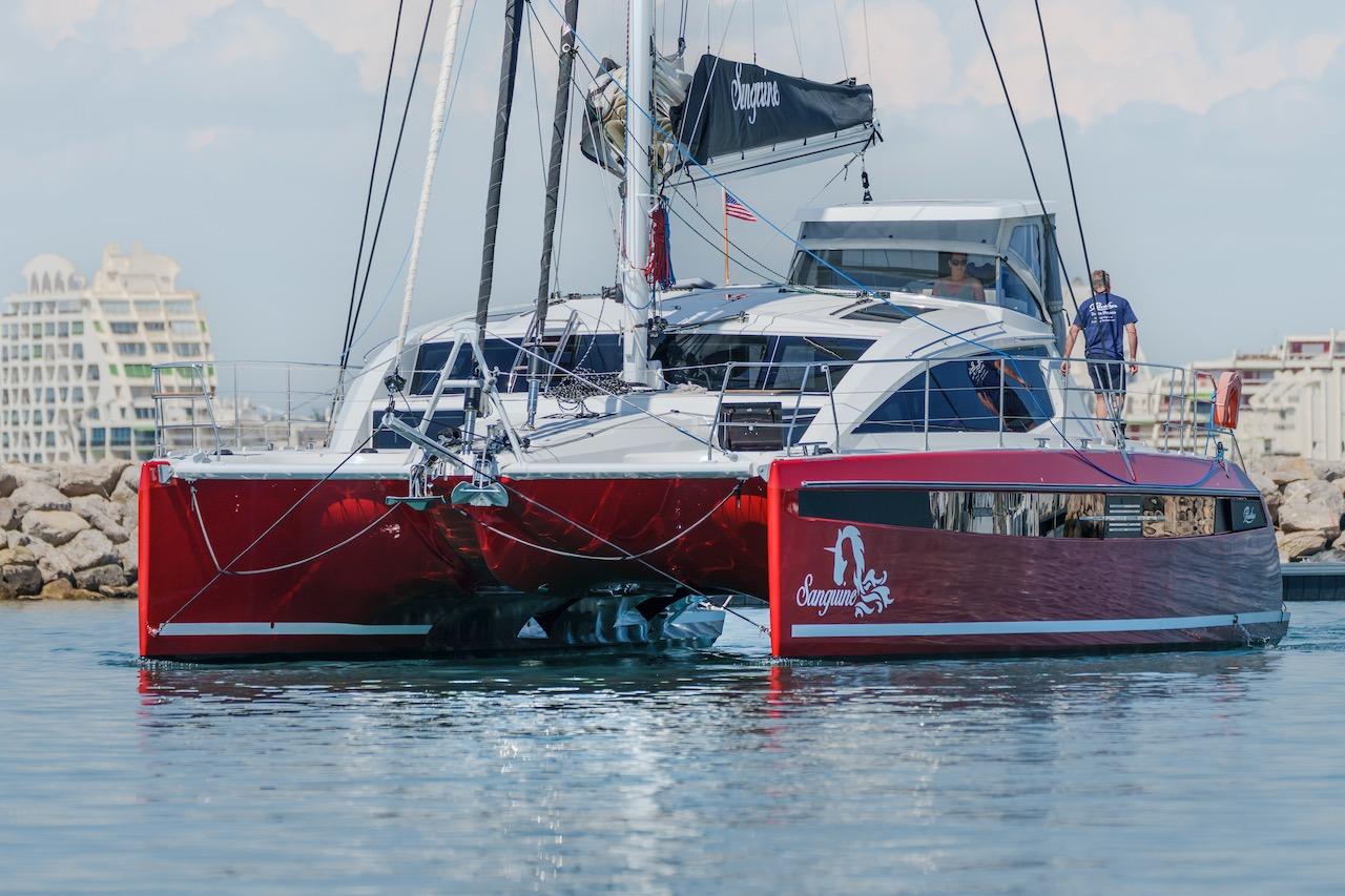 Privilege Signature 510 catamaran, 2025 model, docked in harbor.