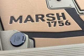 2026 Tracker Grizzly 1756 T Marsh boat logo detail in close-up view.