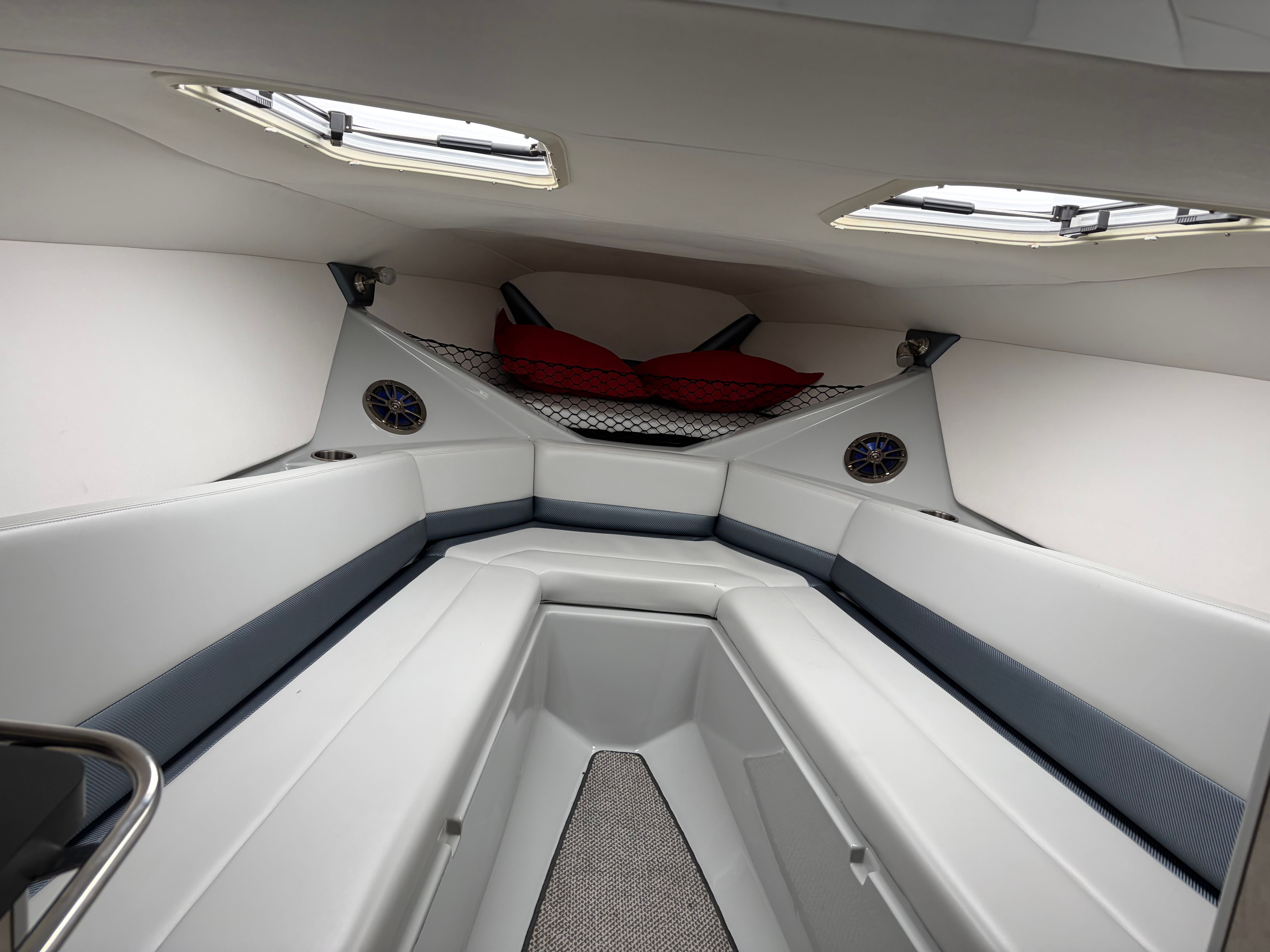 Interior of a 2007 Baja 30 Outlaw boat with seating area.