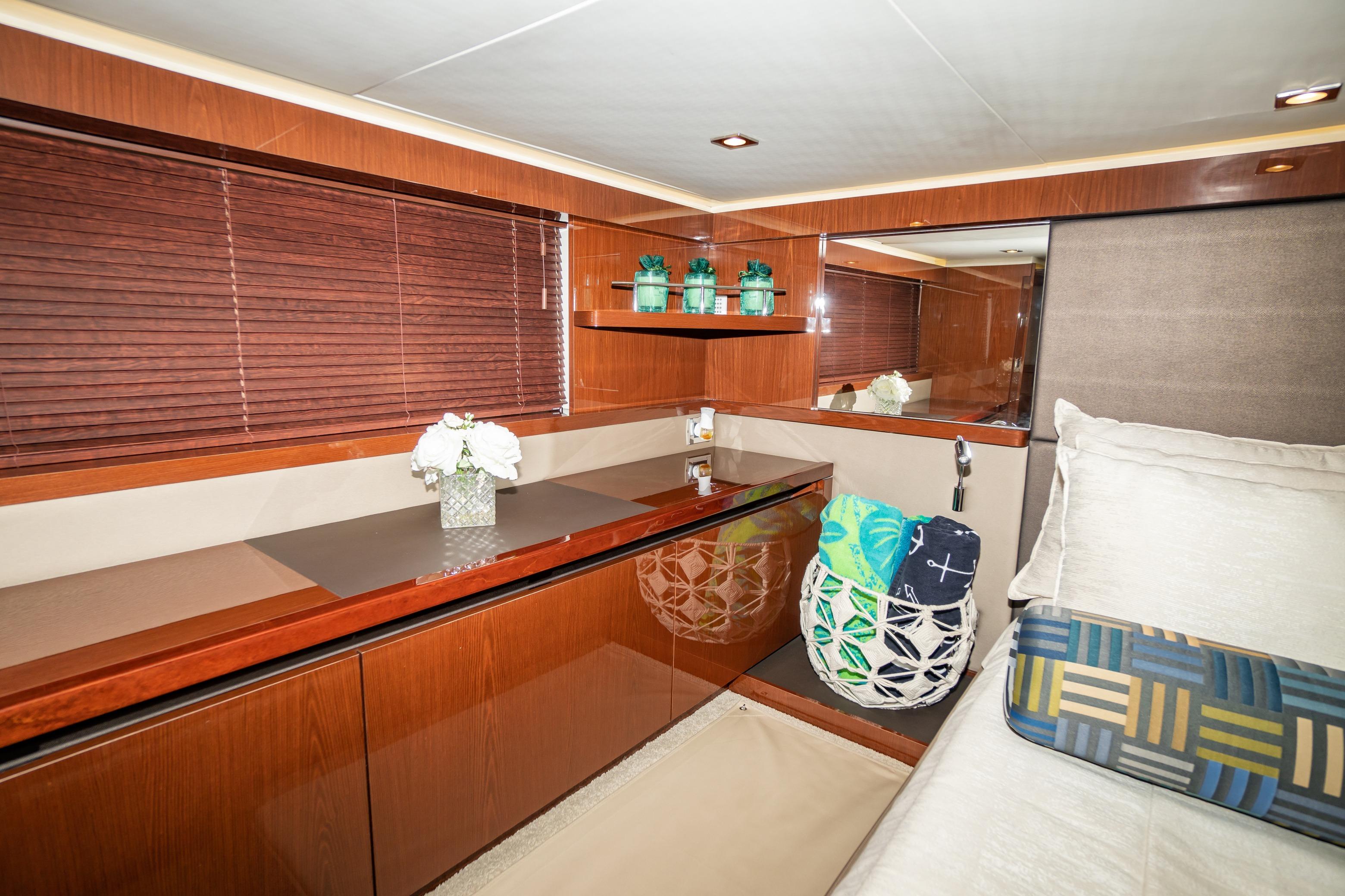 Luxurious interior of 2017 Sea Ray Sundancer 460 yacht with elegant wood finishes.