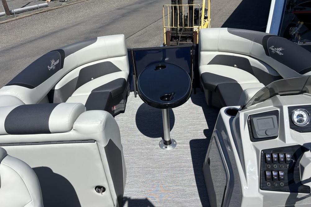2026 SunChaser Geneva Sport 21 SB DH pontoon boat interior with seating and control panel.
