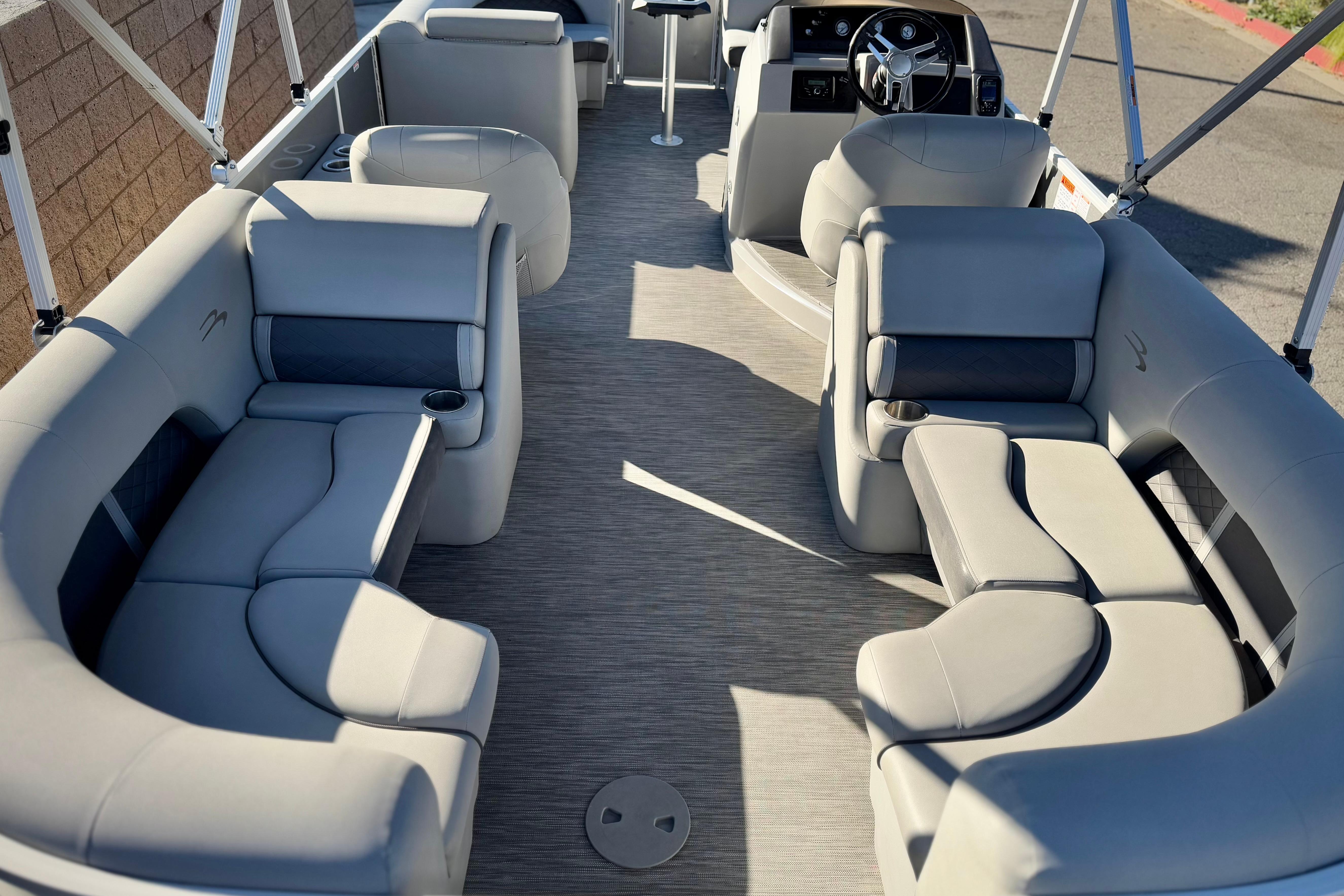 2021 Bennington 23LSR pontoon boat interior with plush seating and modern design.