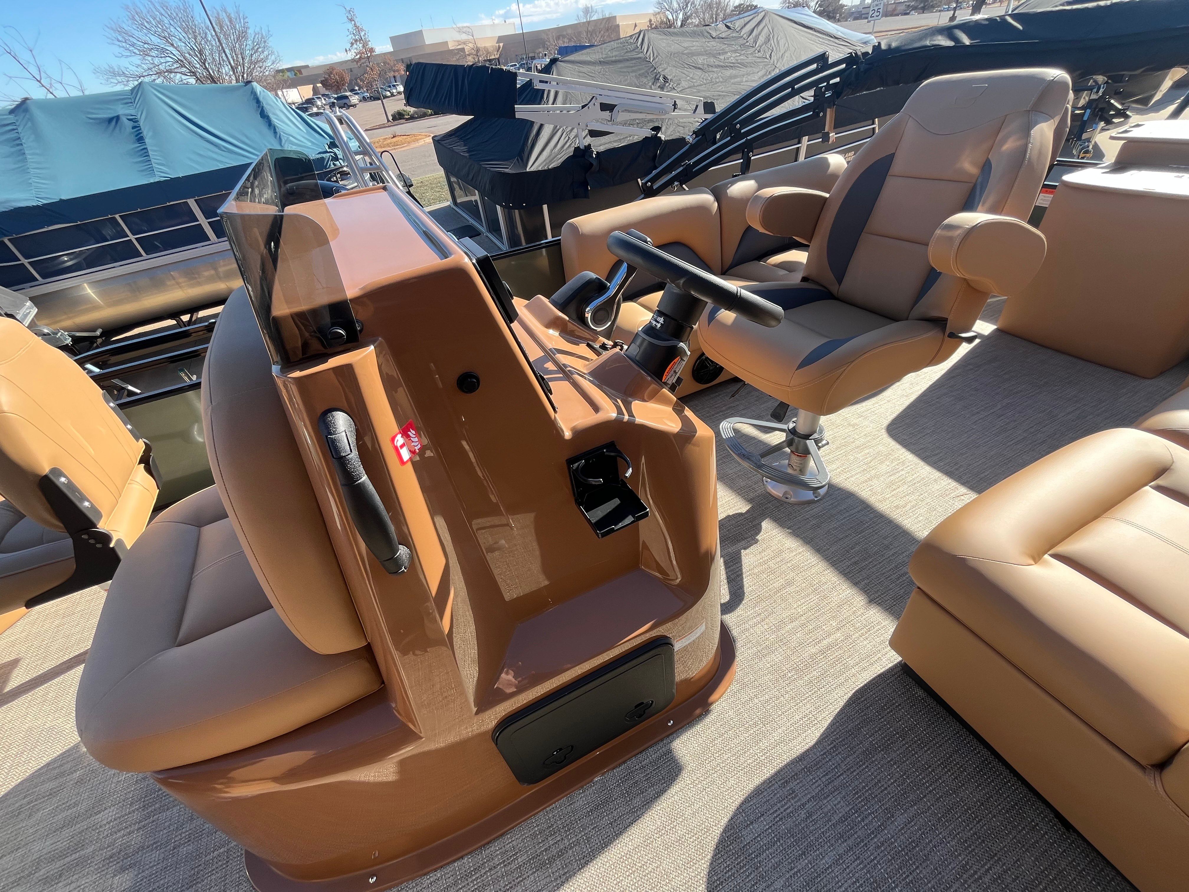 Interior of 2026 Landau Alure 21CC Fish with beige seating.