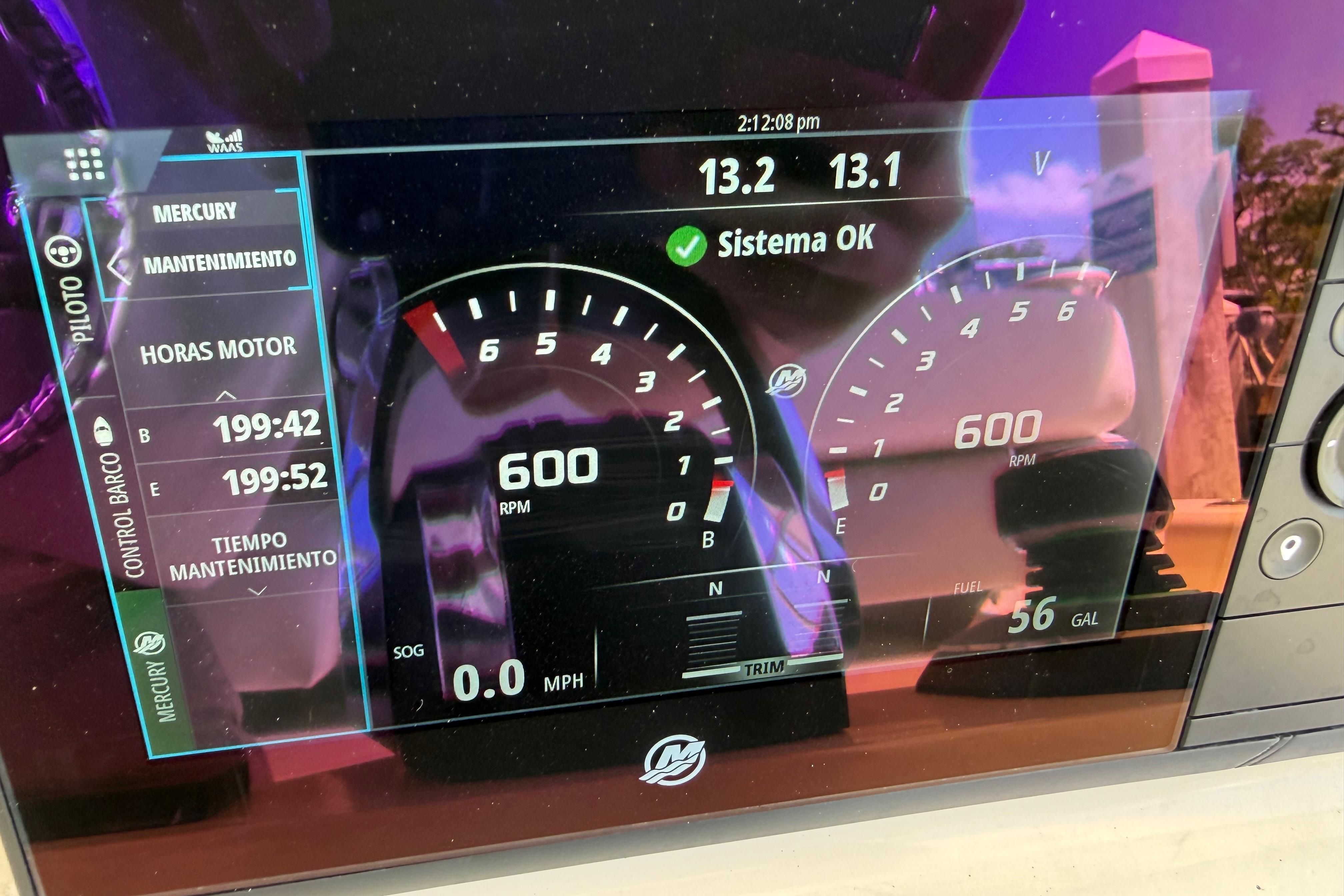 Dashboard of a 2019 Boston Whaler 330 Outrage showing engine metrics and system status.