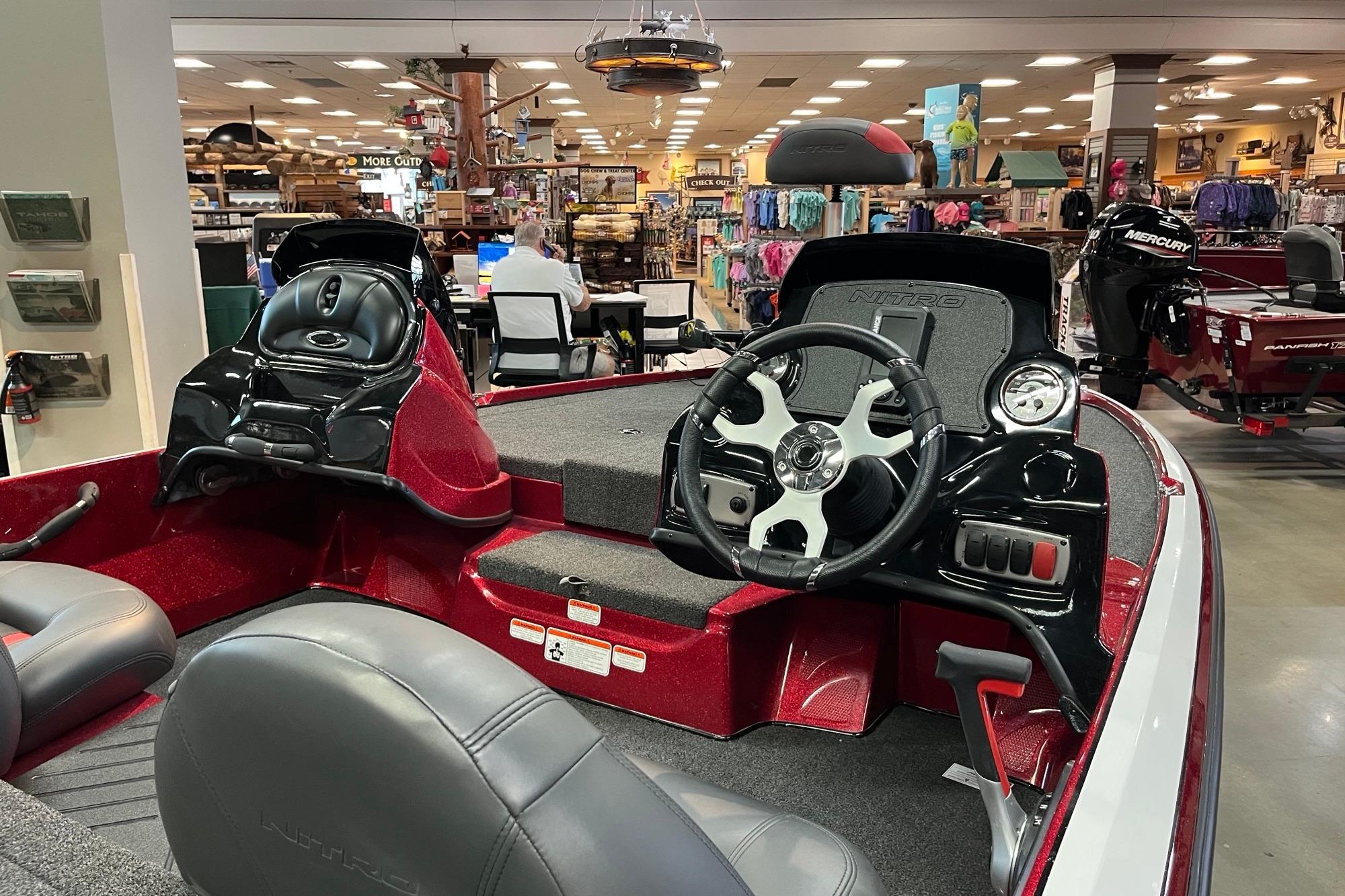 Interior of a 2026 Nitro Z17 boat displayed in a showroom.