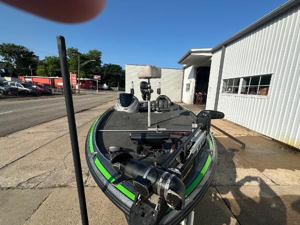 2017 Nitro Z21 Z-Pro High Performance boat parked outside a garage.
