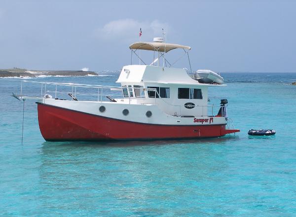 Great Harbour N40 boat, 2025 model, anchored in clear turquoise waters.