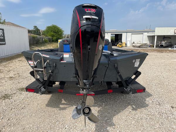 2025 Ranger RT188P boat with Mercury 115 outboard motor, parked on gravel.