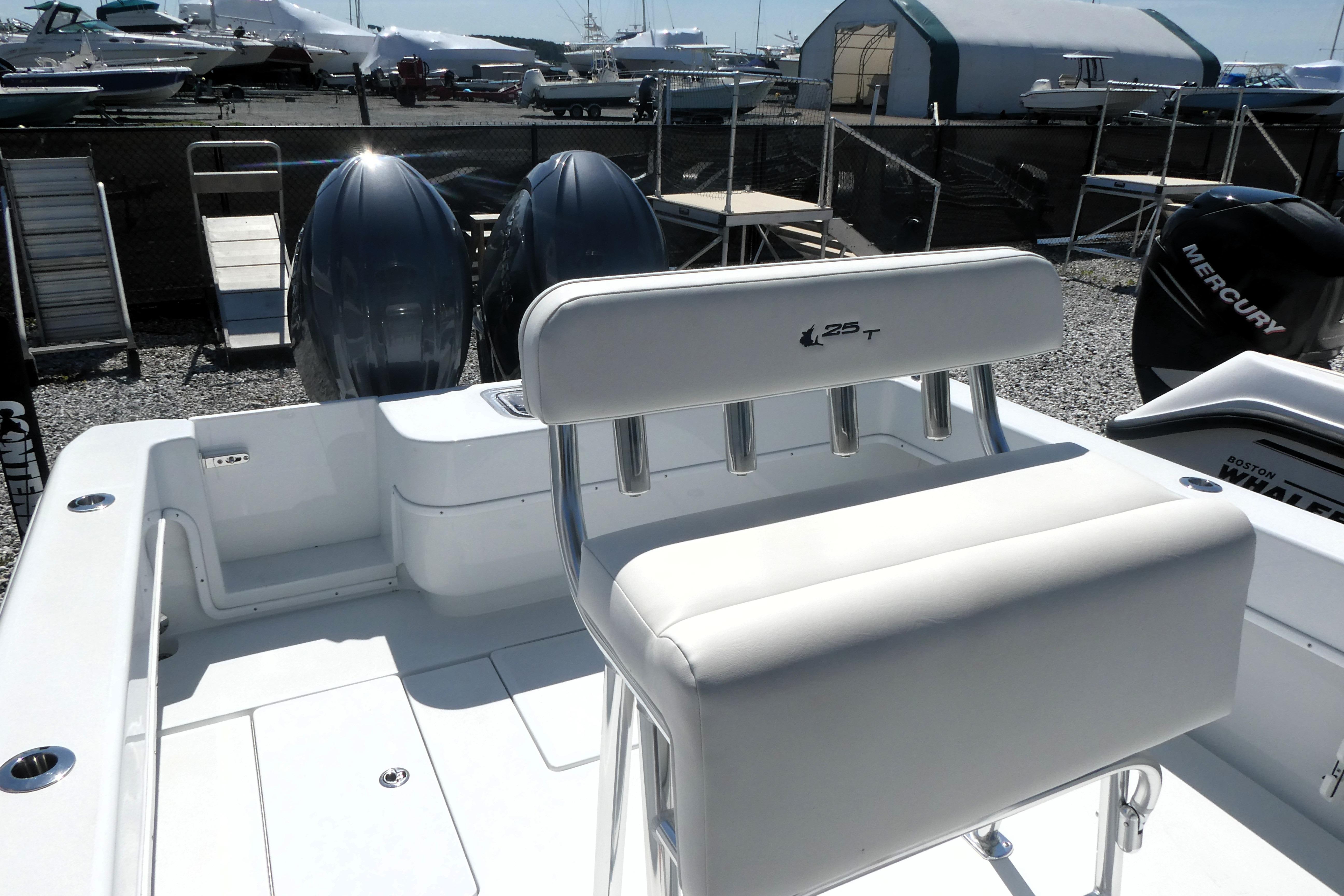 2026 Contender 25 Tournament boat interior with dual engines and seating.