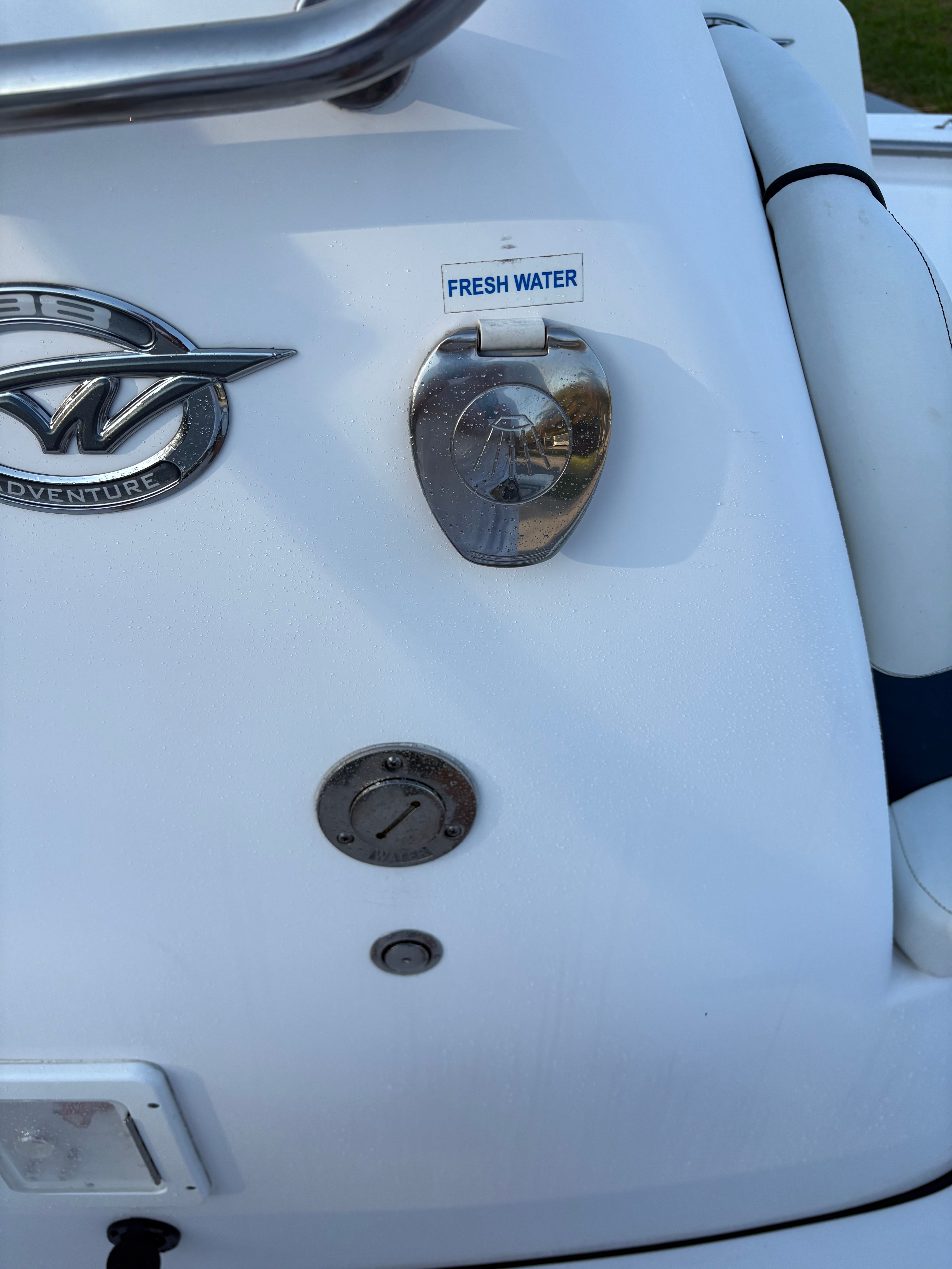 Close-up of a fresh water connection on a boat.
