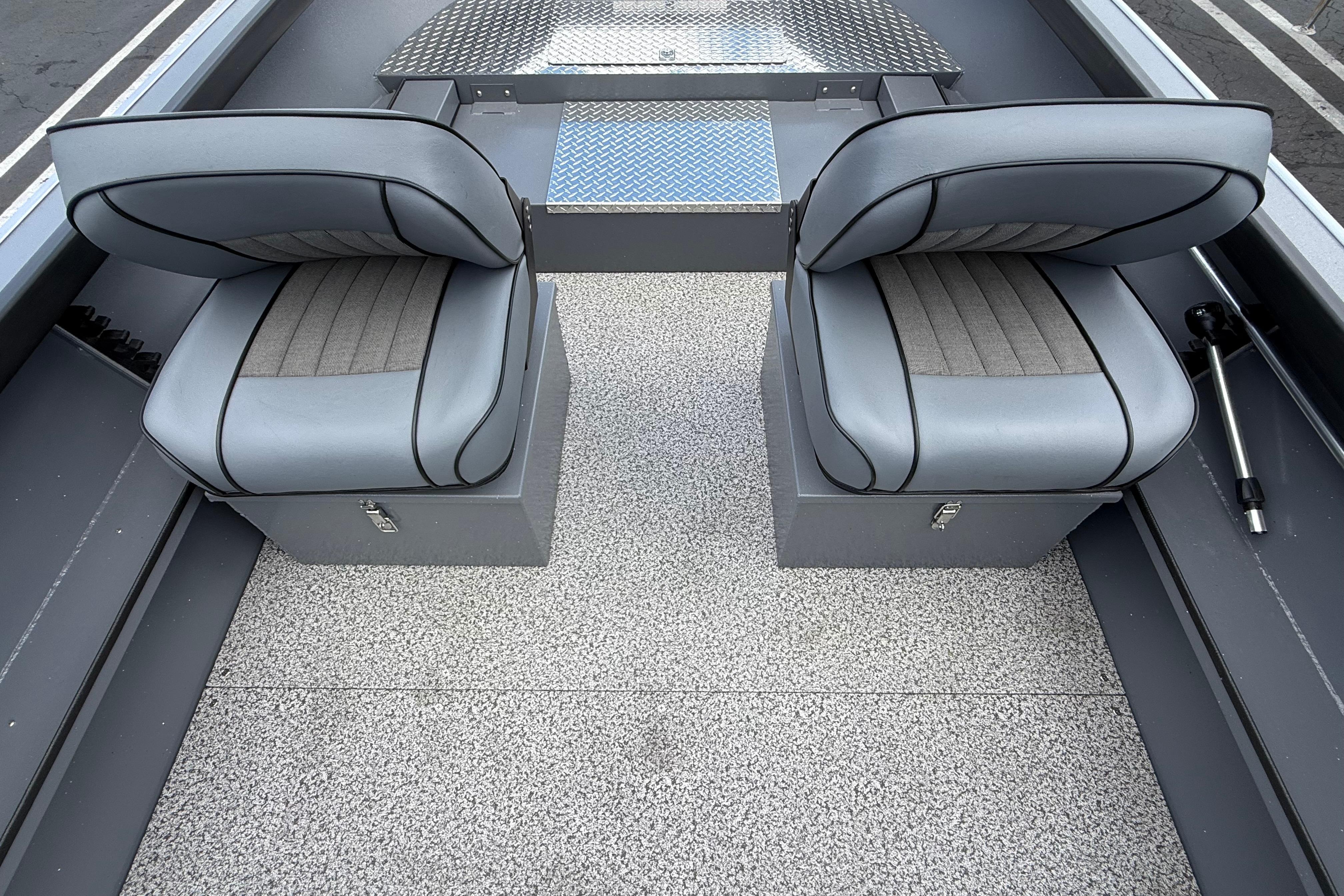 2026 Alumaweld Free Drifter 20 boat interior with two gray cushioned seats.