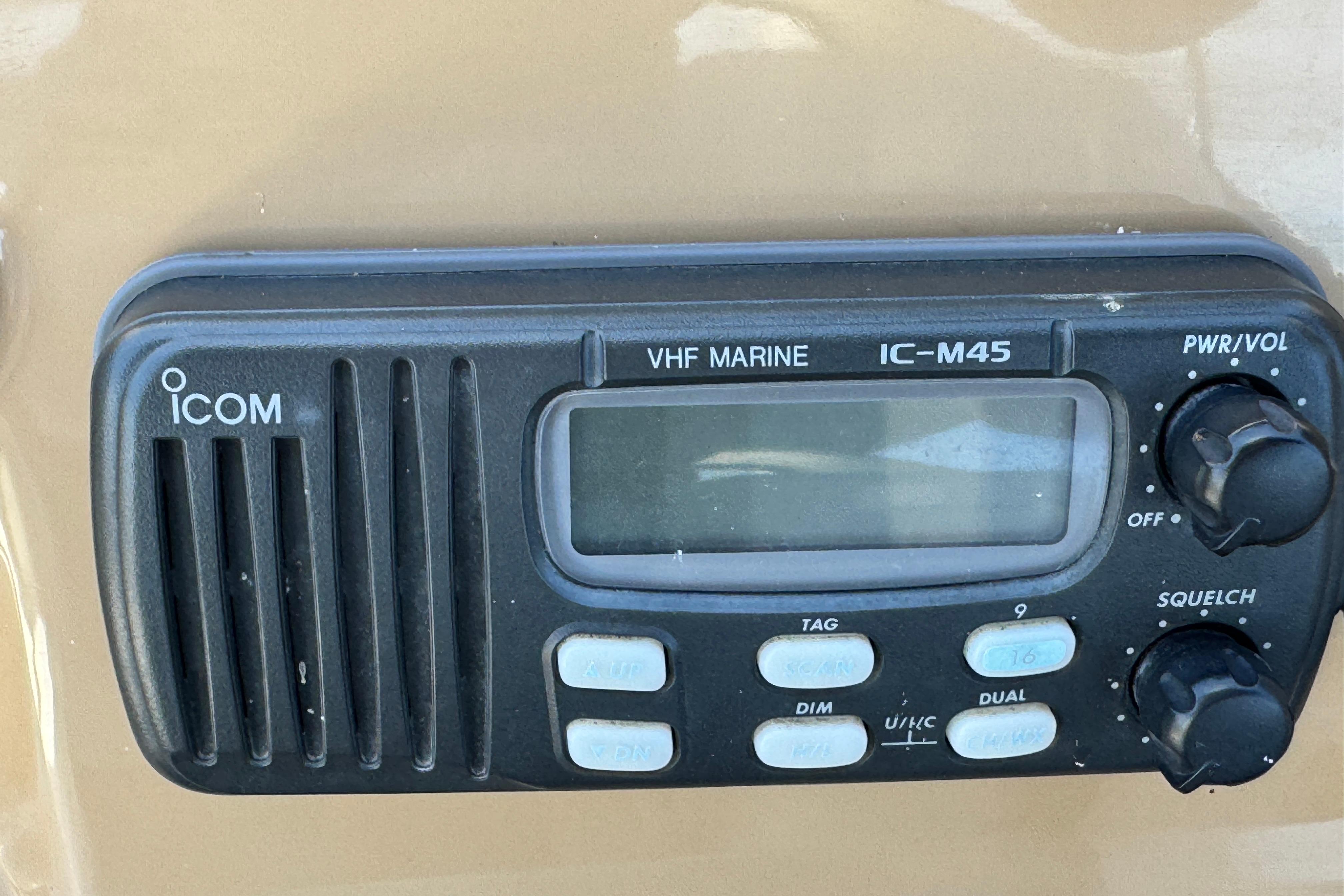 VHF marine radio IC-M45 on 2002 Carver 396 Motor Yacht dashboard.