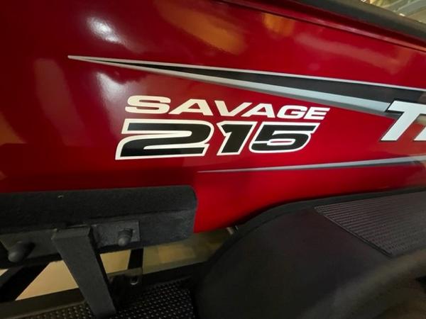 Red 2025 Tracker Savage 215 boat with bold white lettering.