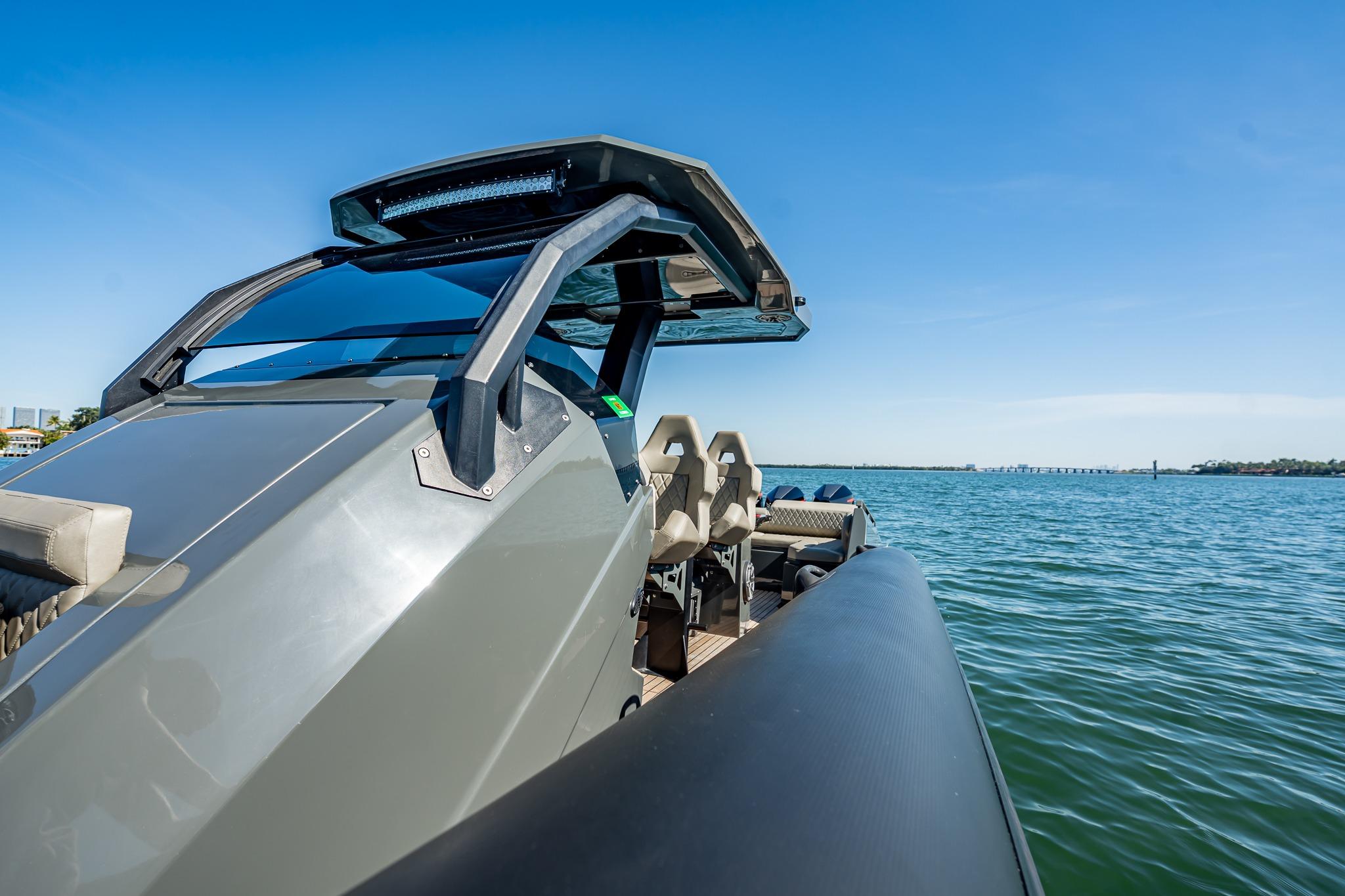 2023 Skipper-BSK 38NC boat on calm water under clear blue sky.