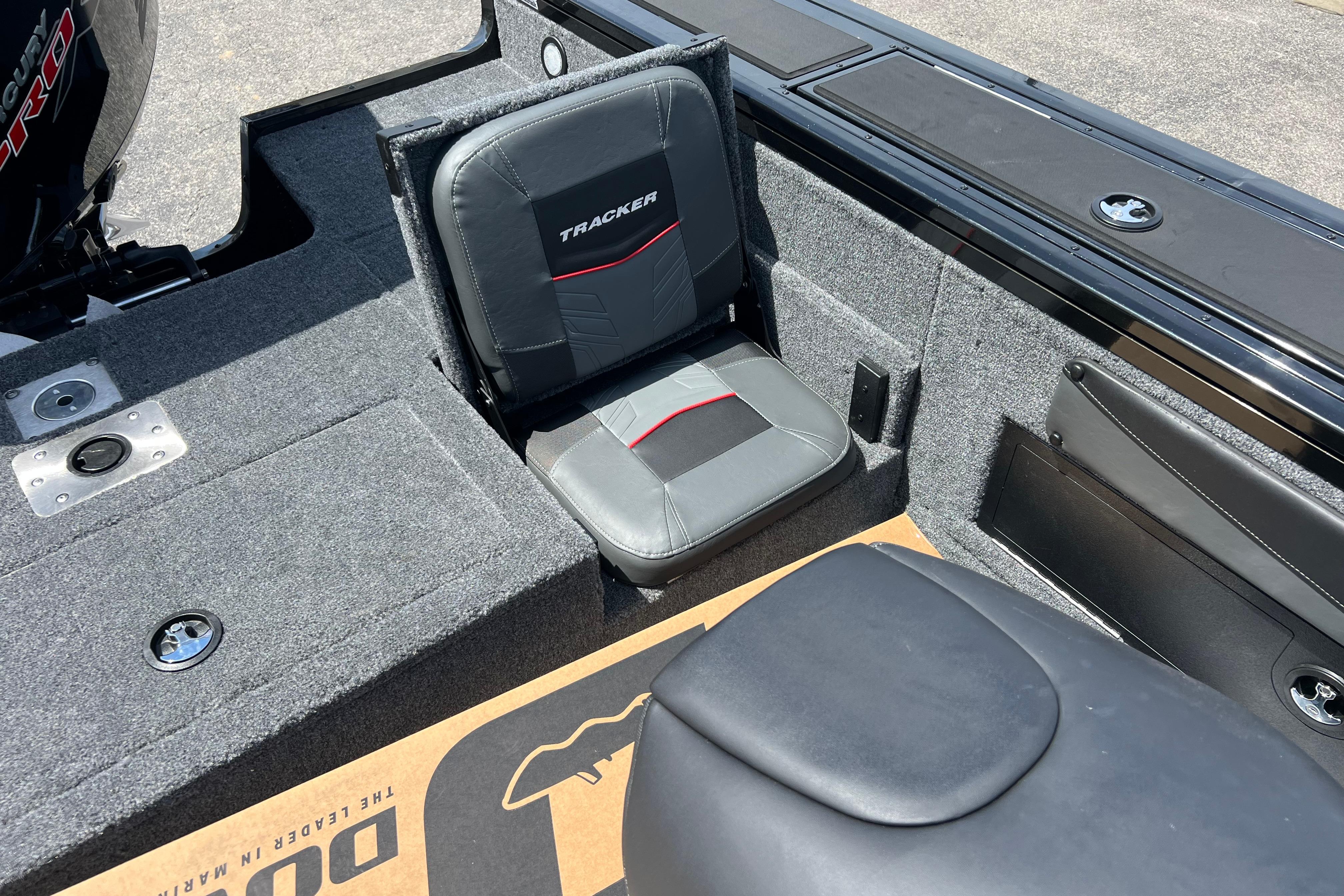 2026 Tracker Targa V-19 Combo boat interior with cushioned seating and storage compartments.