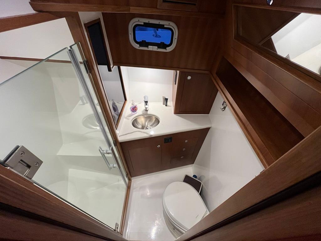 Modern bathroom in 2025 Bracewell 41 yacht with sleek design and compact layout.