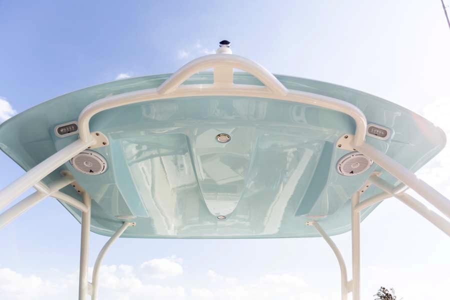 Manufacturer Provided Image: 2026 Cobia 240 Dual Console boat canopy, light blue, with integrated speakers and lights.