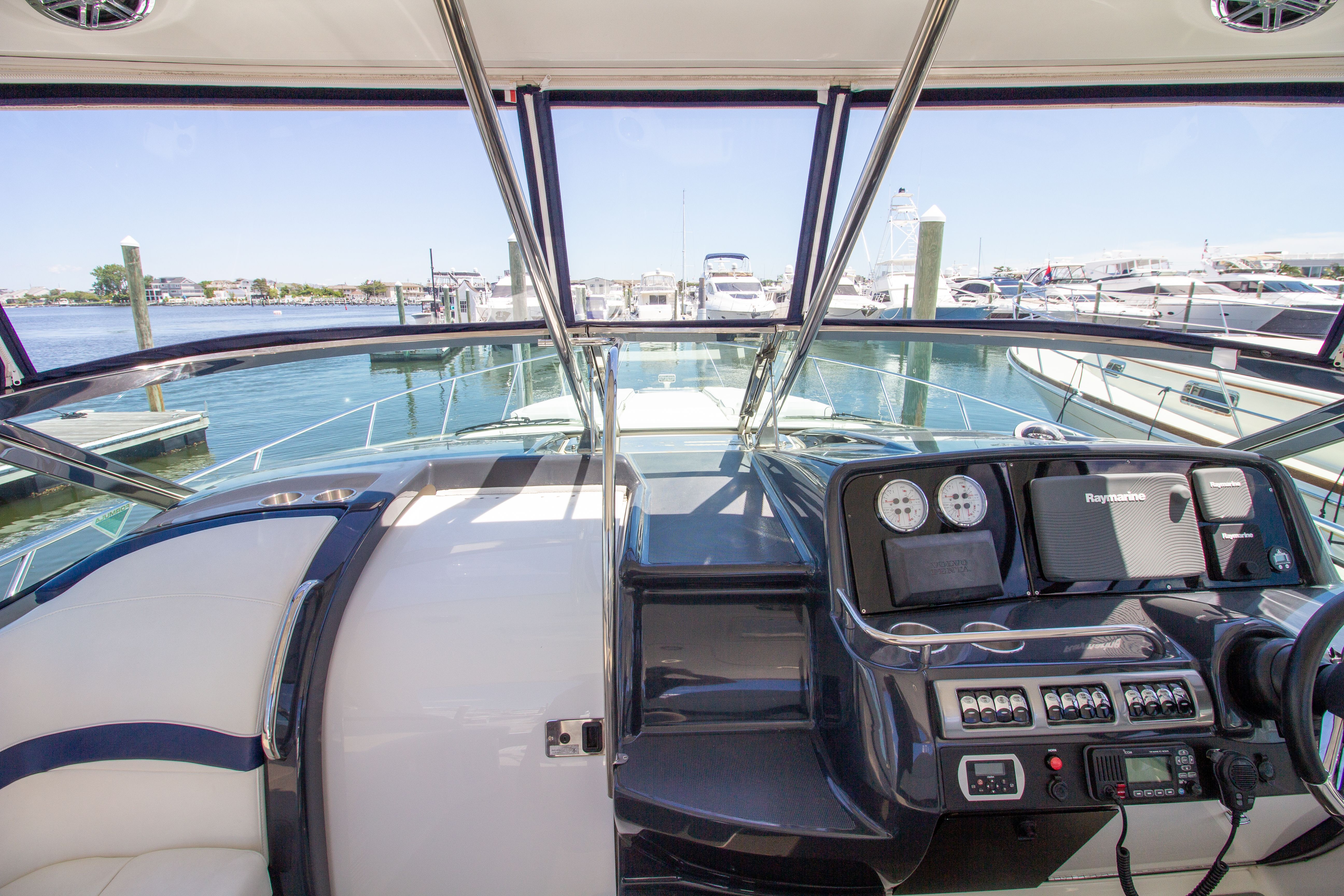 Cockpit of a 2016 Formula 40 Performance Cruiser overlooking the marina.