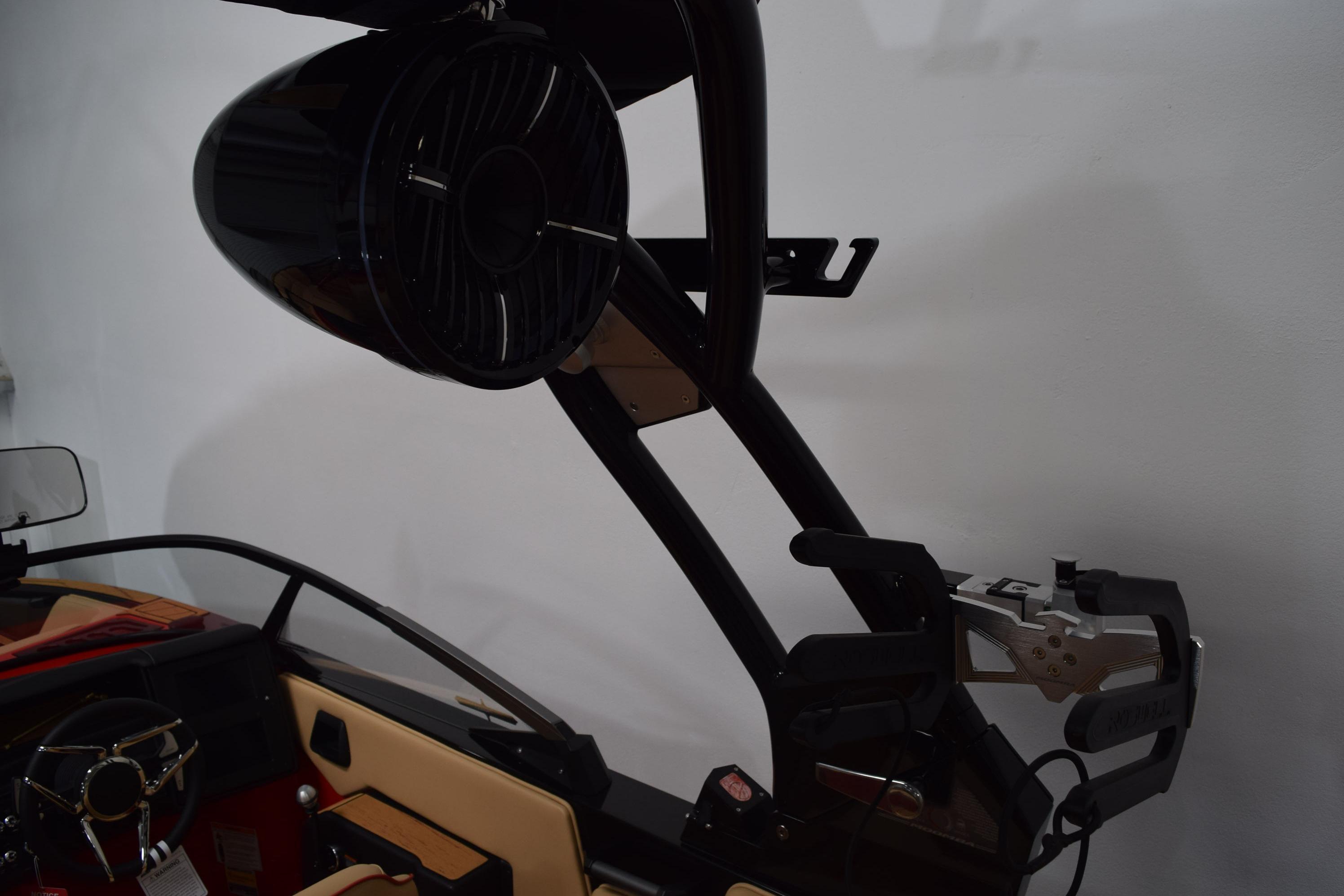 2026 Moomba Max boat interior with speaker and wakeboard rack.