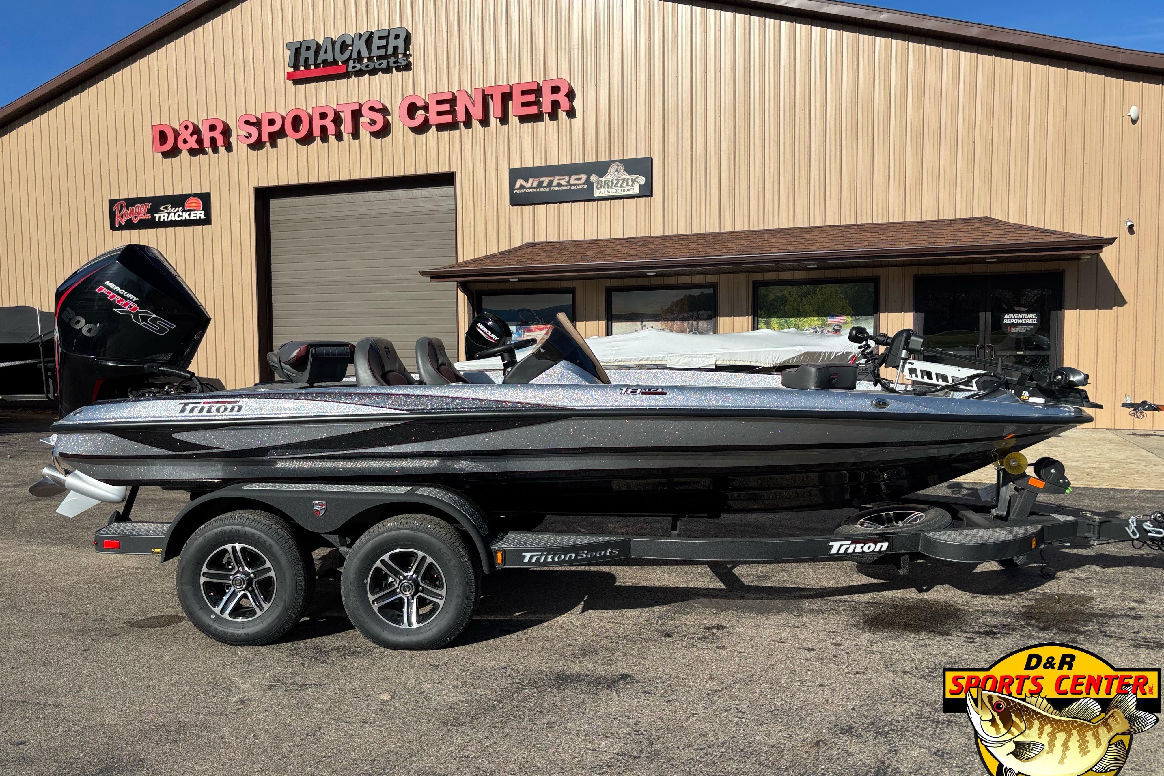 2025 Triton 18 TrX boat at D&R Sports Center, parked on a trailer.