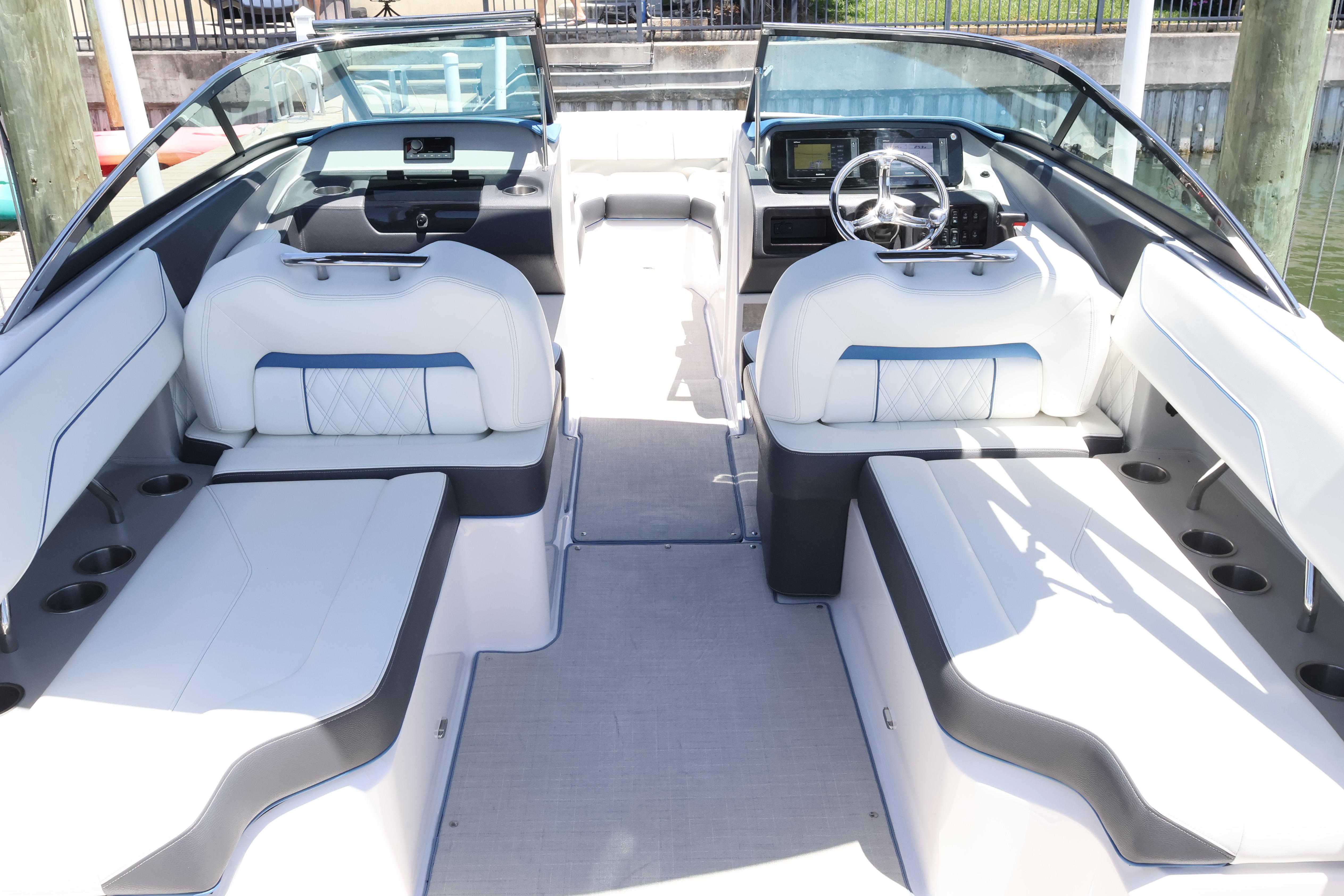Interior of a 2020 Regal LX4 boat with luxurious seating and modern dashboard.