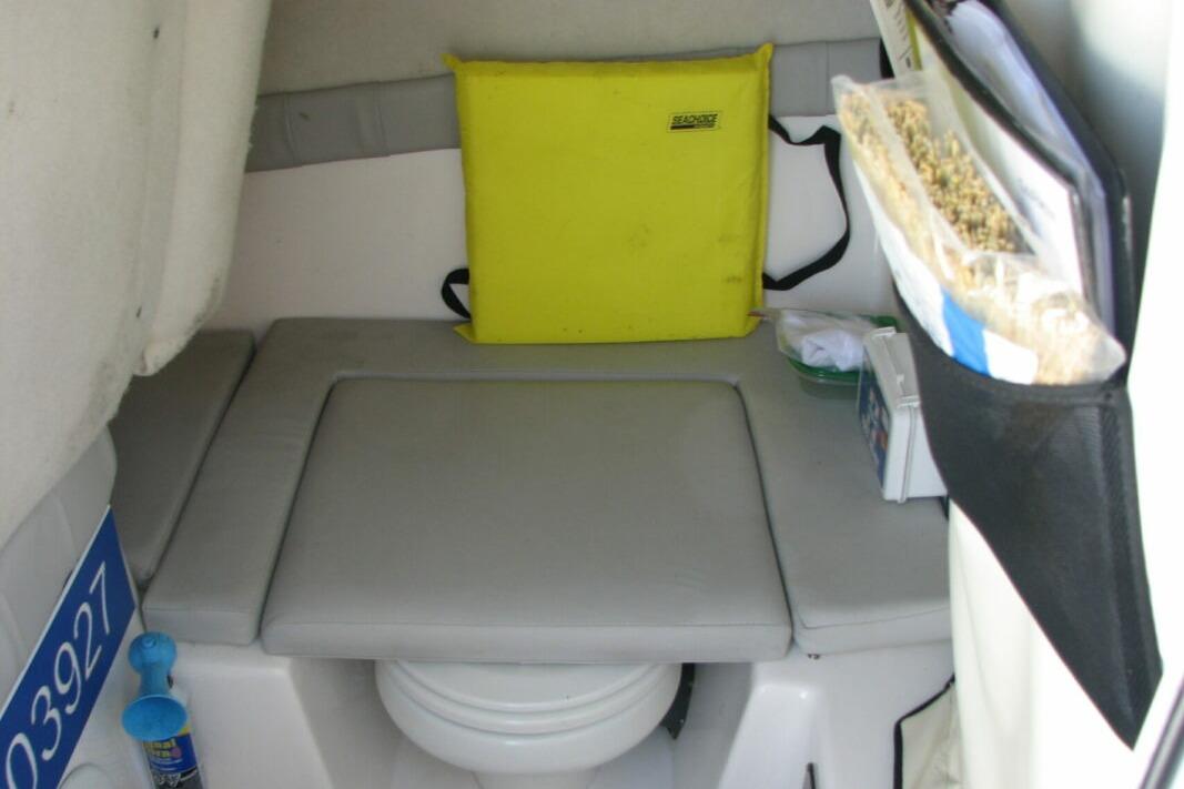 2020 Sea Fox 249 Avenger cabin interior with seating and storage compartments.