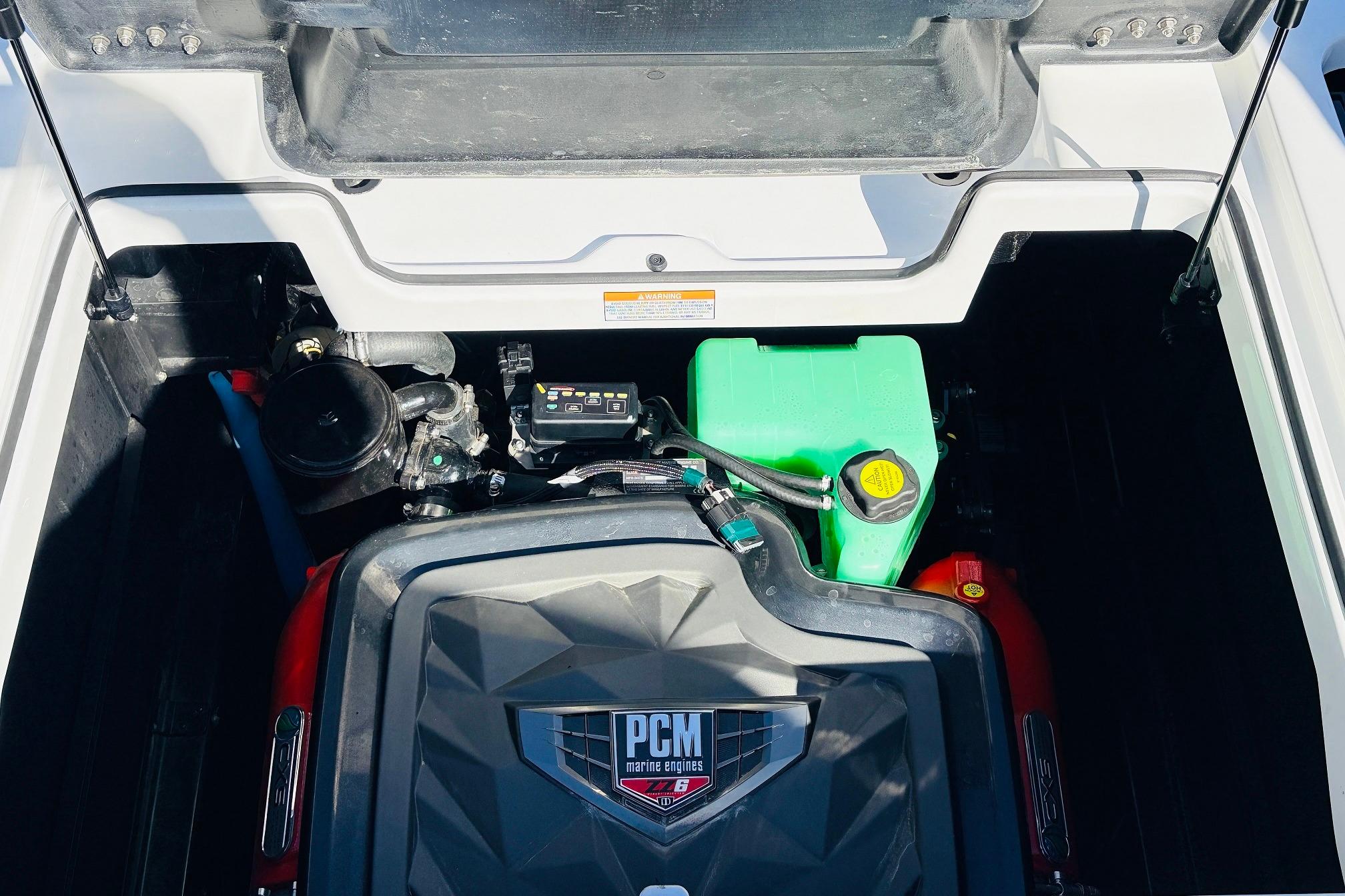 2023 Nautique Super Air Nautique G25 engine compartment with PCM marine engine.