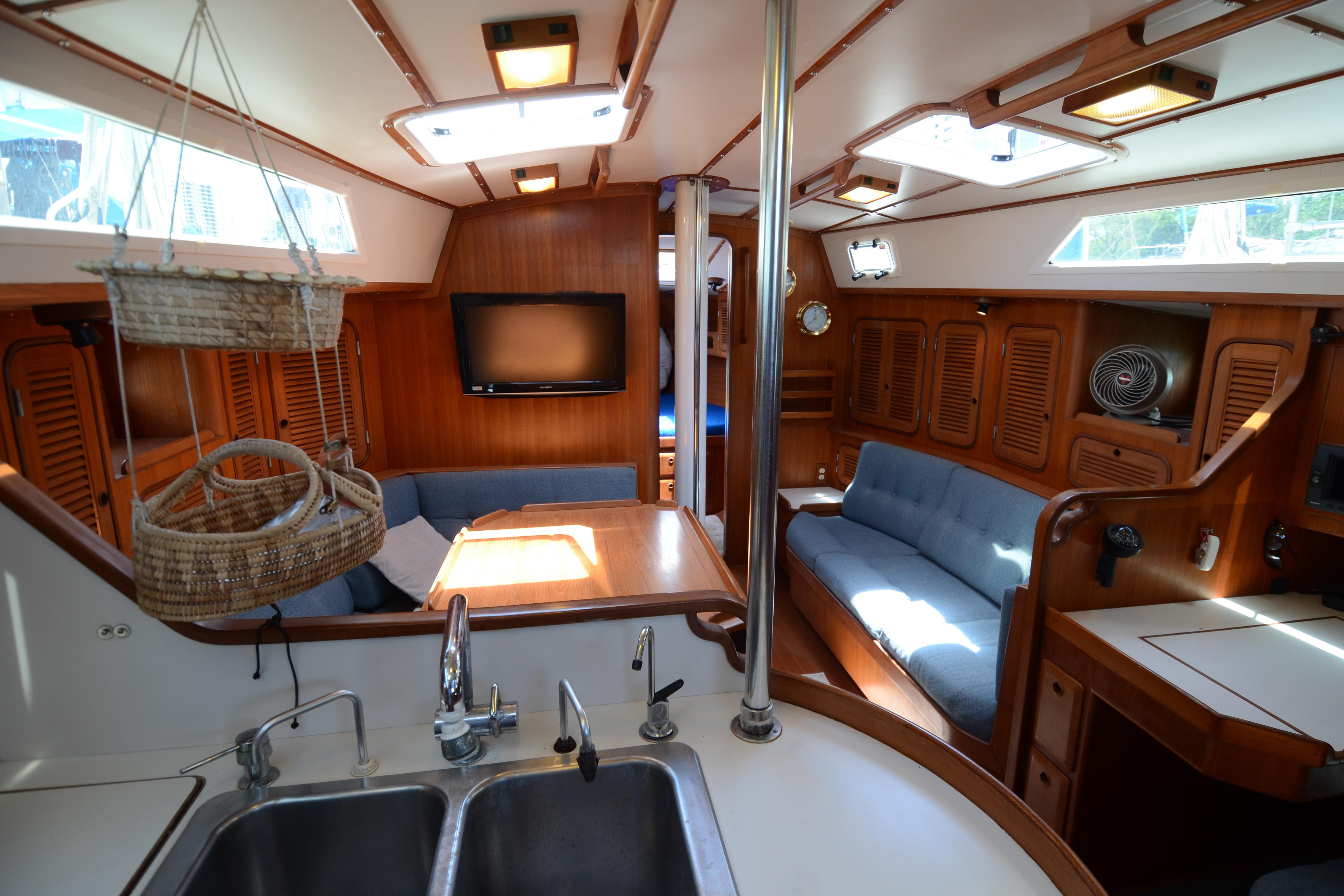Interior of 1987 Norseman 400 yacht with wood paneling and modern amenities.