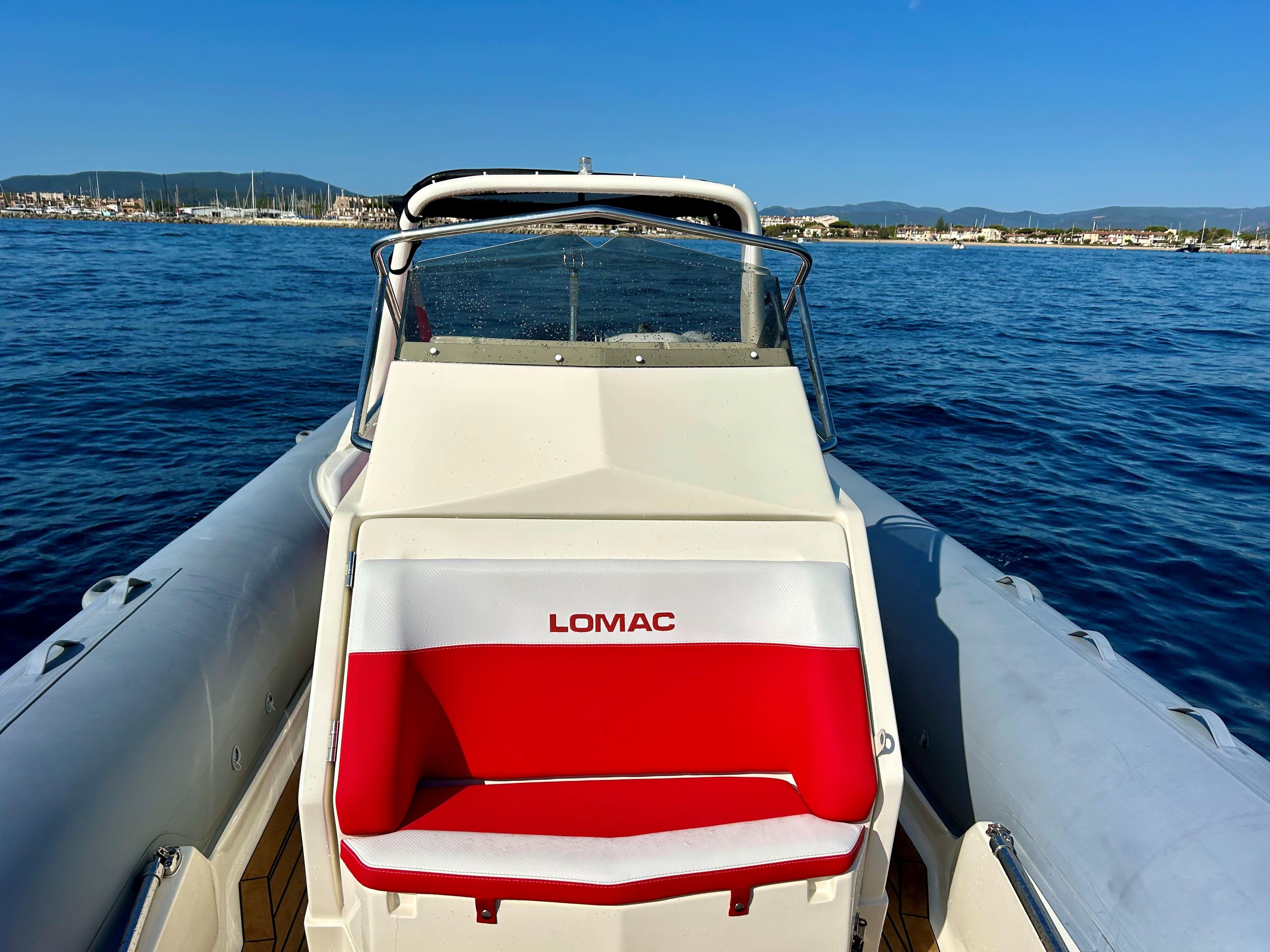 2020 Lomac 790 TURISMO boat on calm sea with red and white seating.