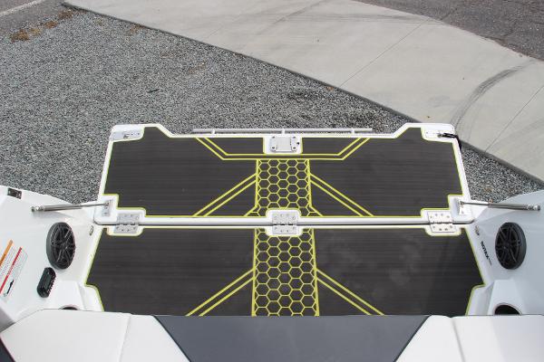 2023 Scarab 255 Open ID boat deck with yellow hexagonal pattern.