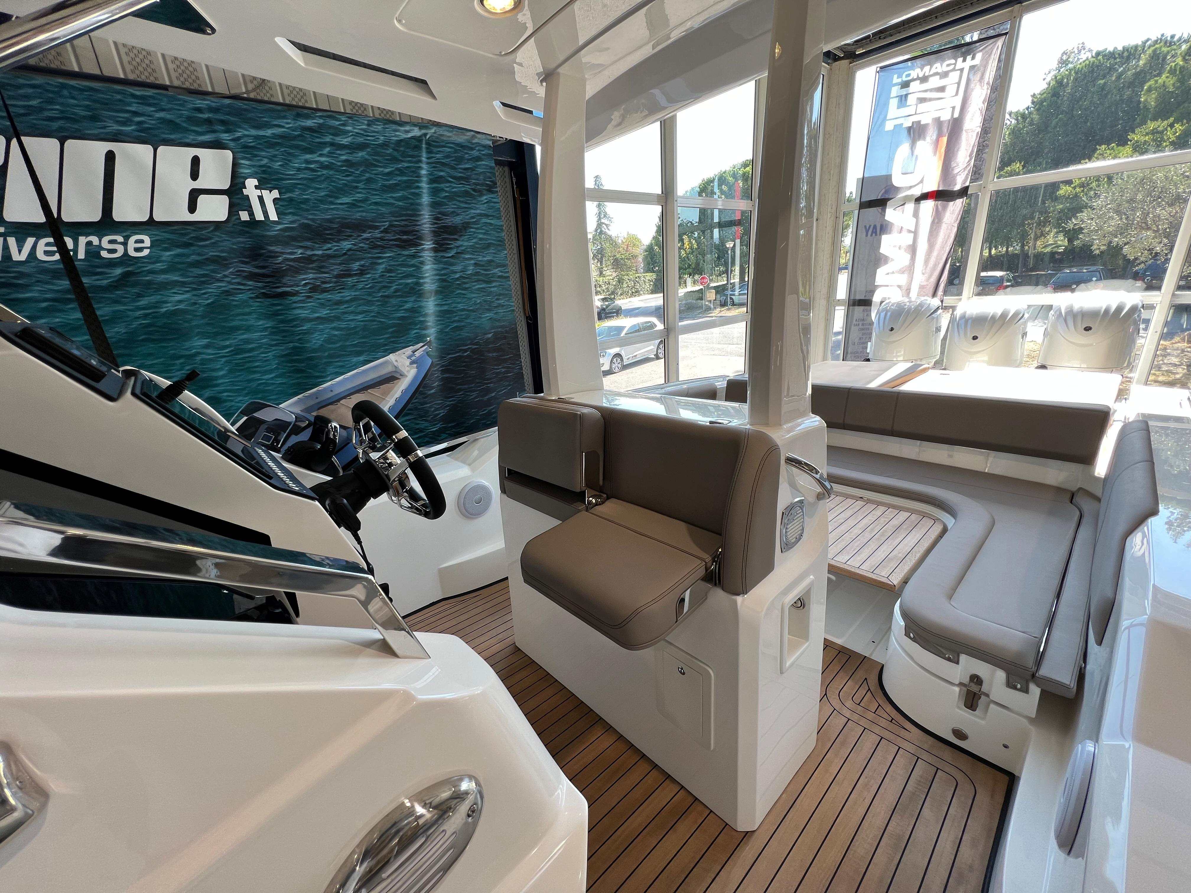 2023 Lomac GranTurismo 12.0 interior with modern seating and steering area.