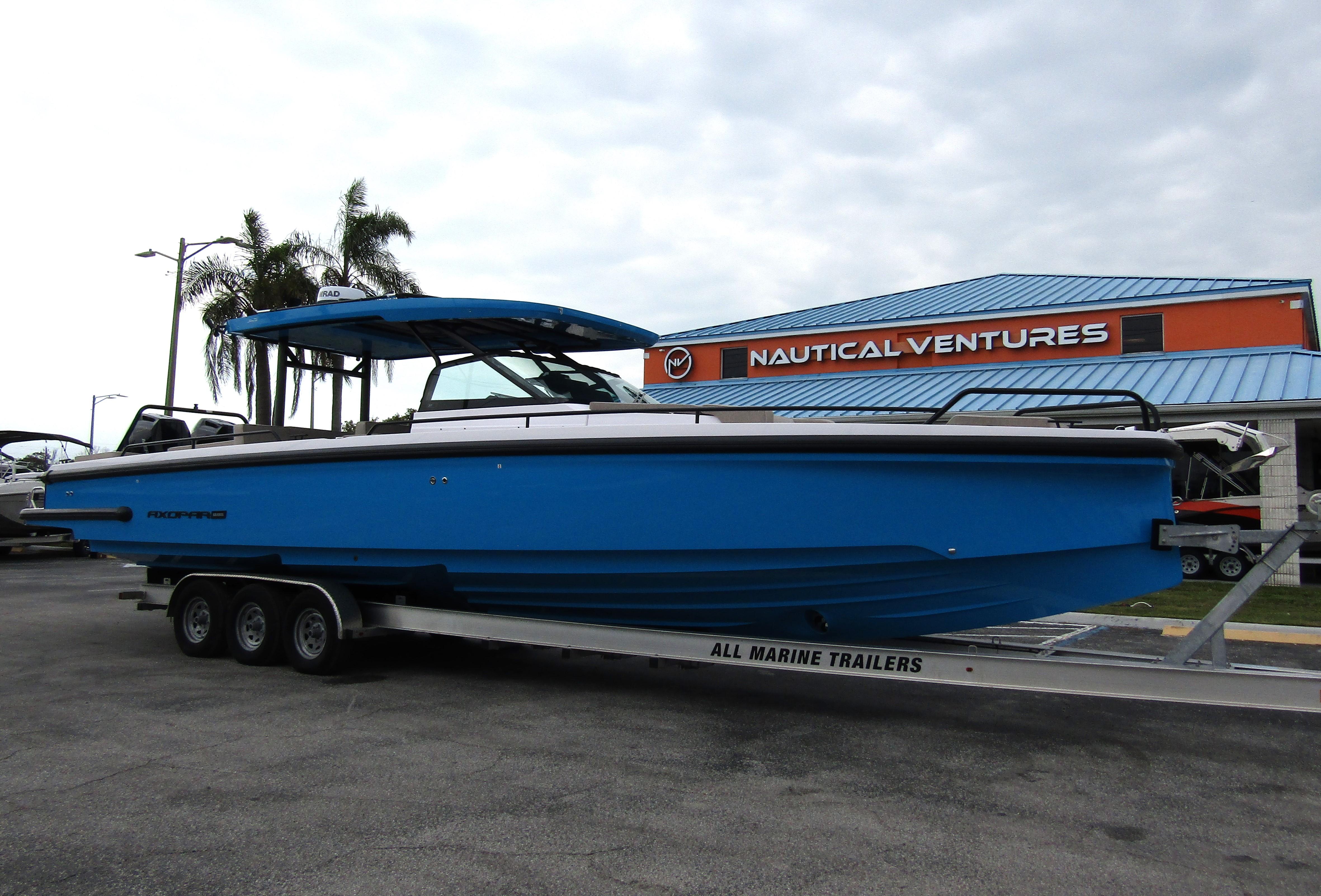2024 Axopar 37 Sun Top boat on trailer at Nautical Ventures dealership.