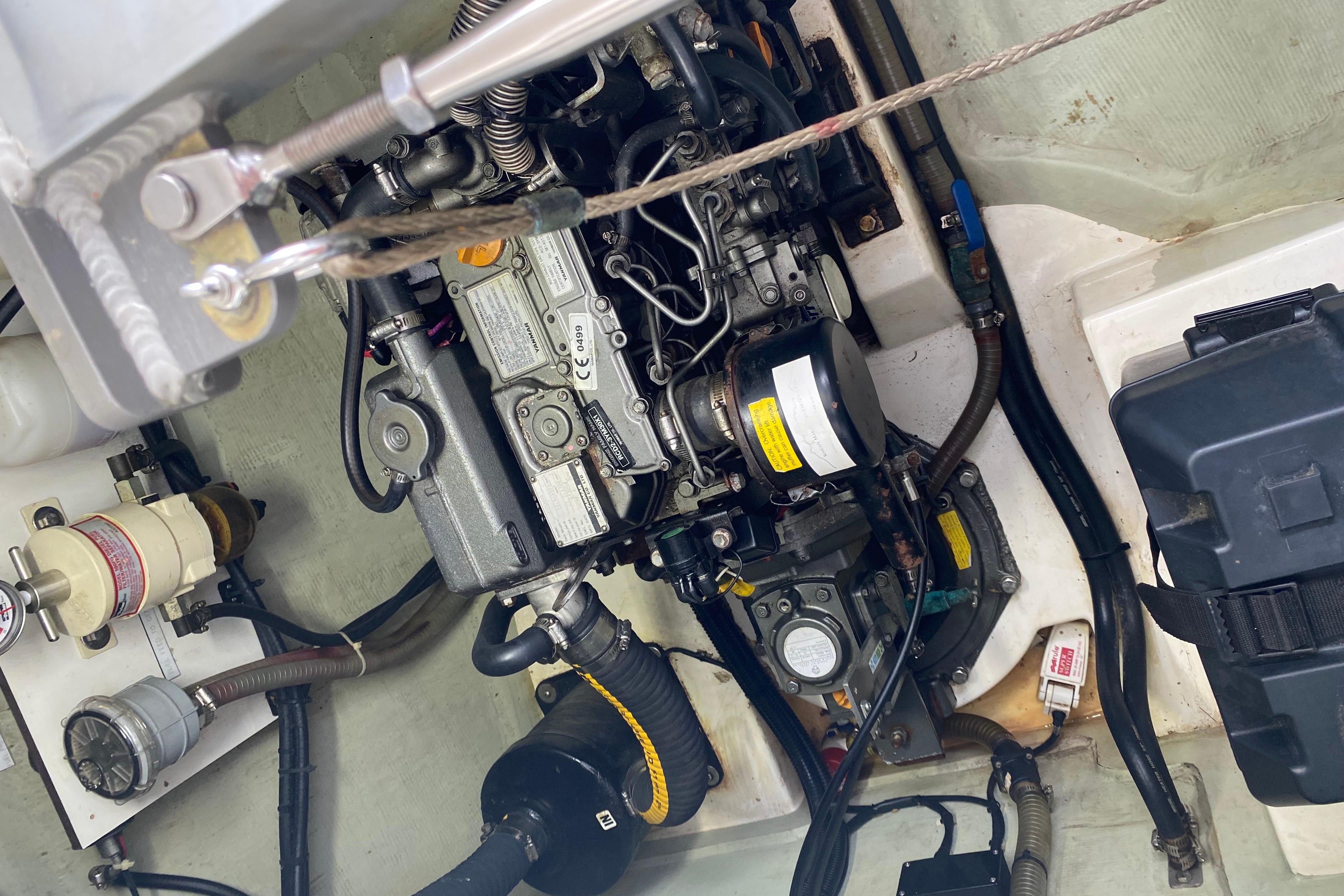 Engine compartment of a 2017 Leopard 40, showcasing mechanical components and wiring.