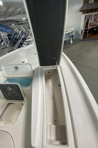 2024 Key West 250 Bay Reef boat storage compartment open.