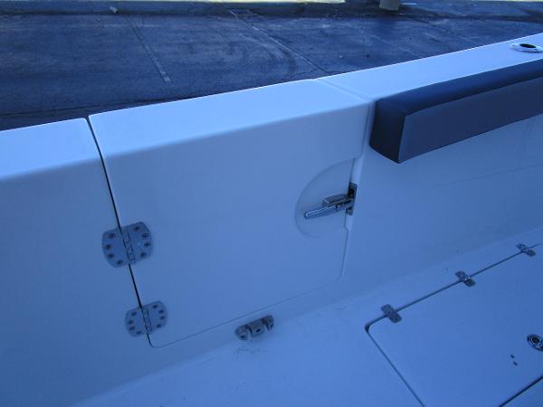 2025 Sea Pro 292 Offshore boat interior detail with hinges and seating.