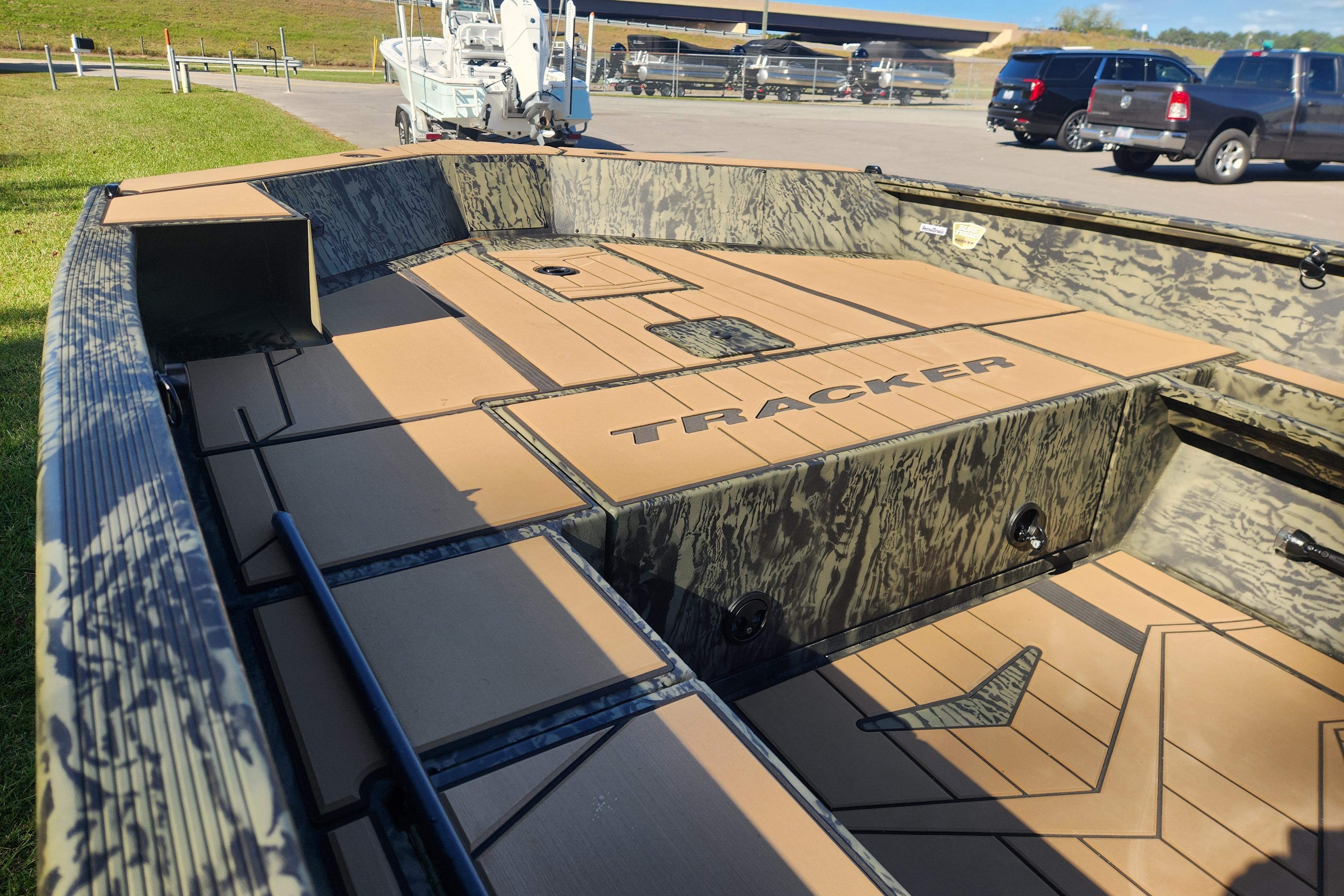 2026 Tracker Grizzly 1756 T Marsh boat interior with camo design and spacious deck.