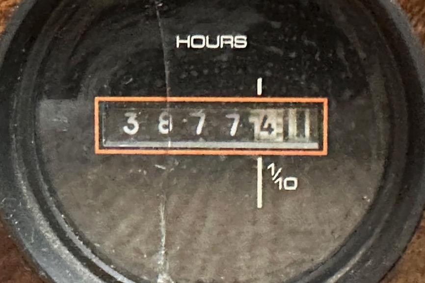 Hour meter reading 3877.4 on a 1985 Egg Harbor 33 Sedan boat.
