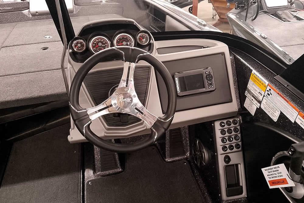 2026 Ranger 2050MS Reata boat dashboard with steering wheel and control panel.