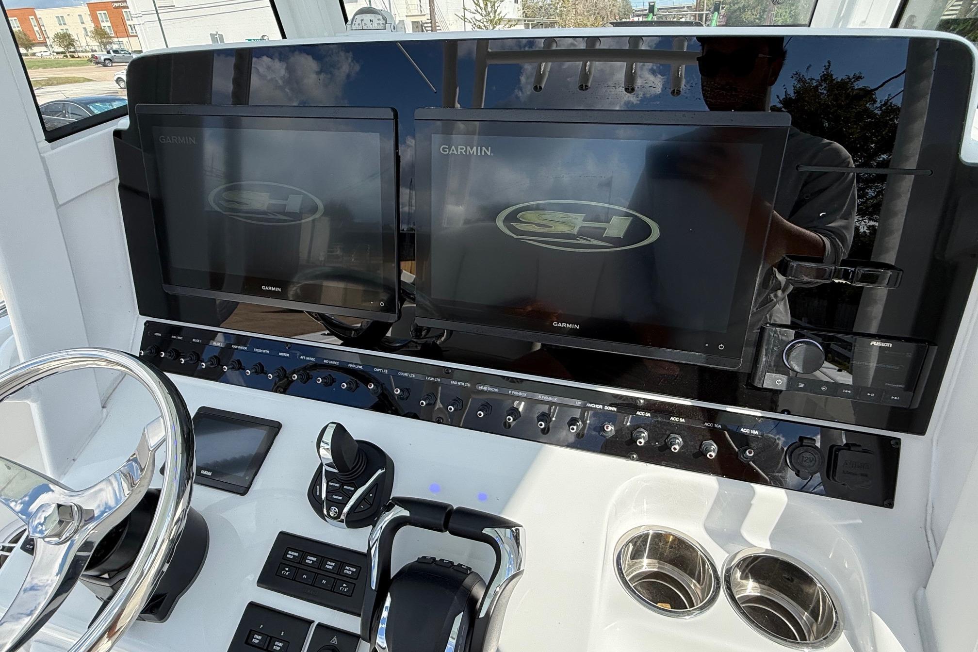Control panel of 2026 Sea Hunt Ultra 285 Coffin Box with dual Garmin displays.