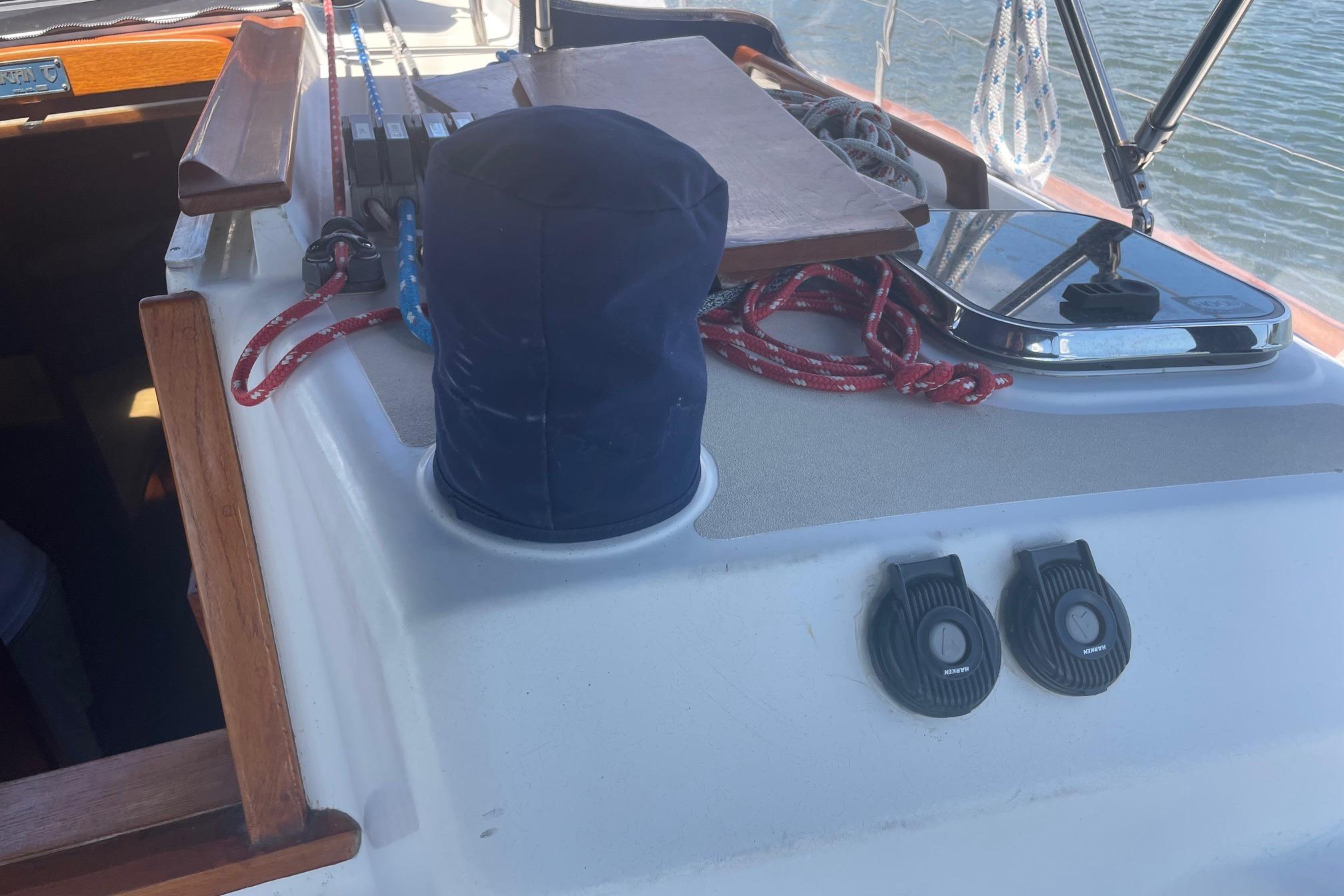 Deck of 2001 Tartan 3700 sailboat with ropes and equipment.