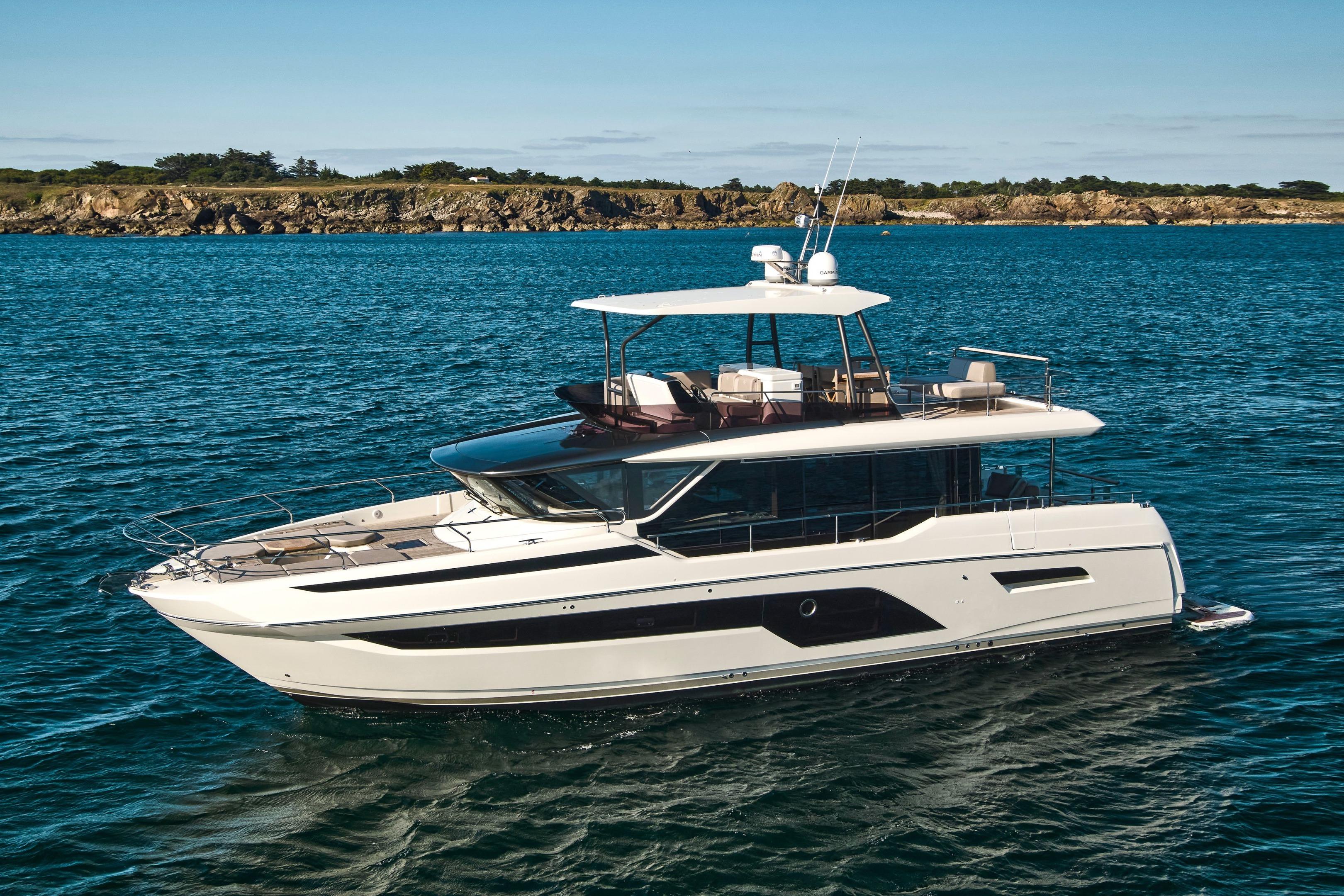 Luxury 2026 Prestige X60 yacht cruising on serene blue waters.