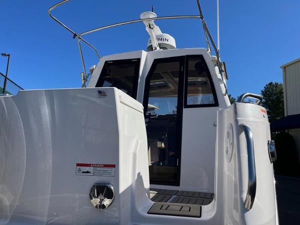 2025 Cutwater C-248 C Coupe boat, rear view, showcasing sleek design and modern features.