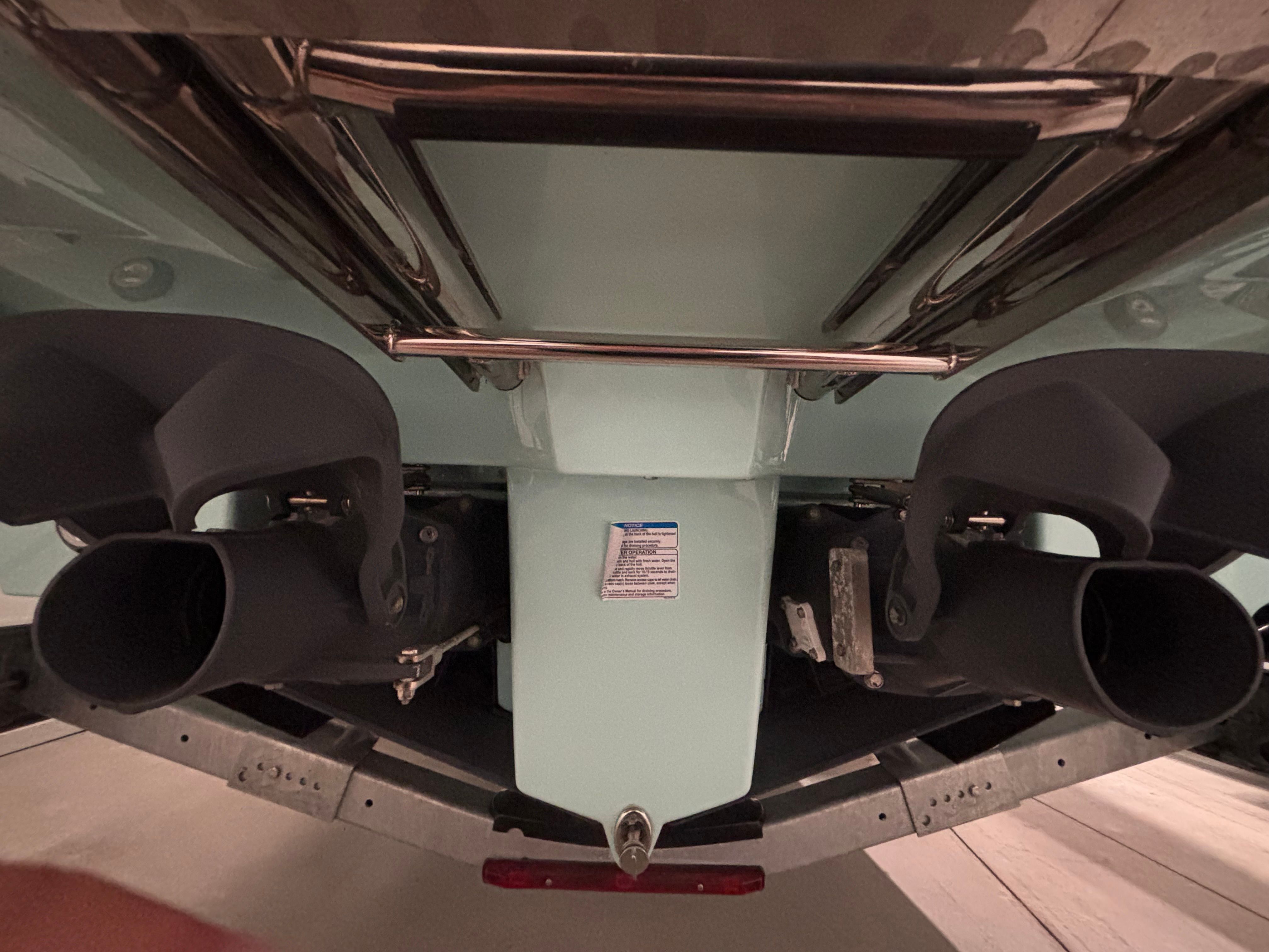 Underside of a Yamaha 222 FSH Sport E boat with dual jet drives.