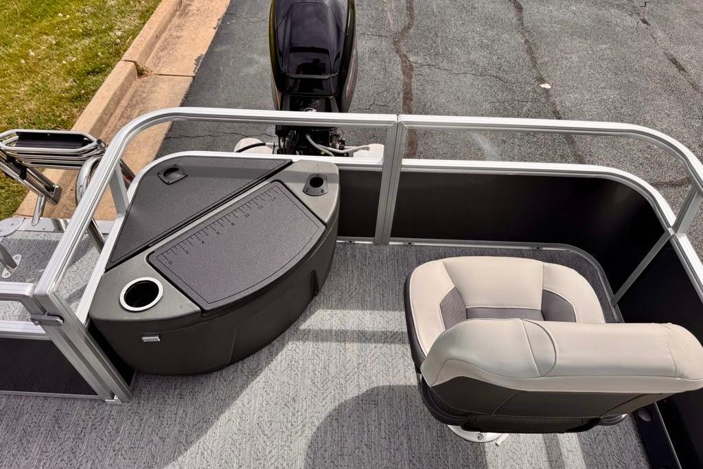 2026 Sun Tracker Bass Buggy 18 DLX interior with seating and fishing station.