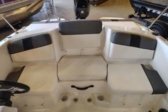 2026 Tahoe T16 boat interior with seating and steering wheel.